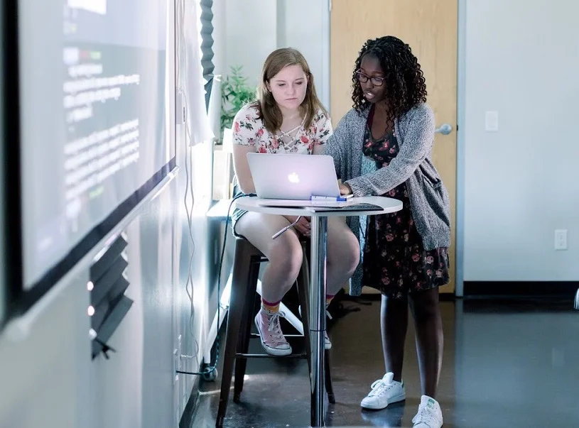 Sofia Ongele (right) developed the app and chatbot ReDawn after attending Kode With Klossy. (Courtesy of Flytographers)