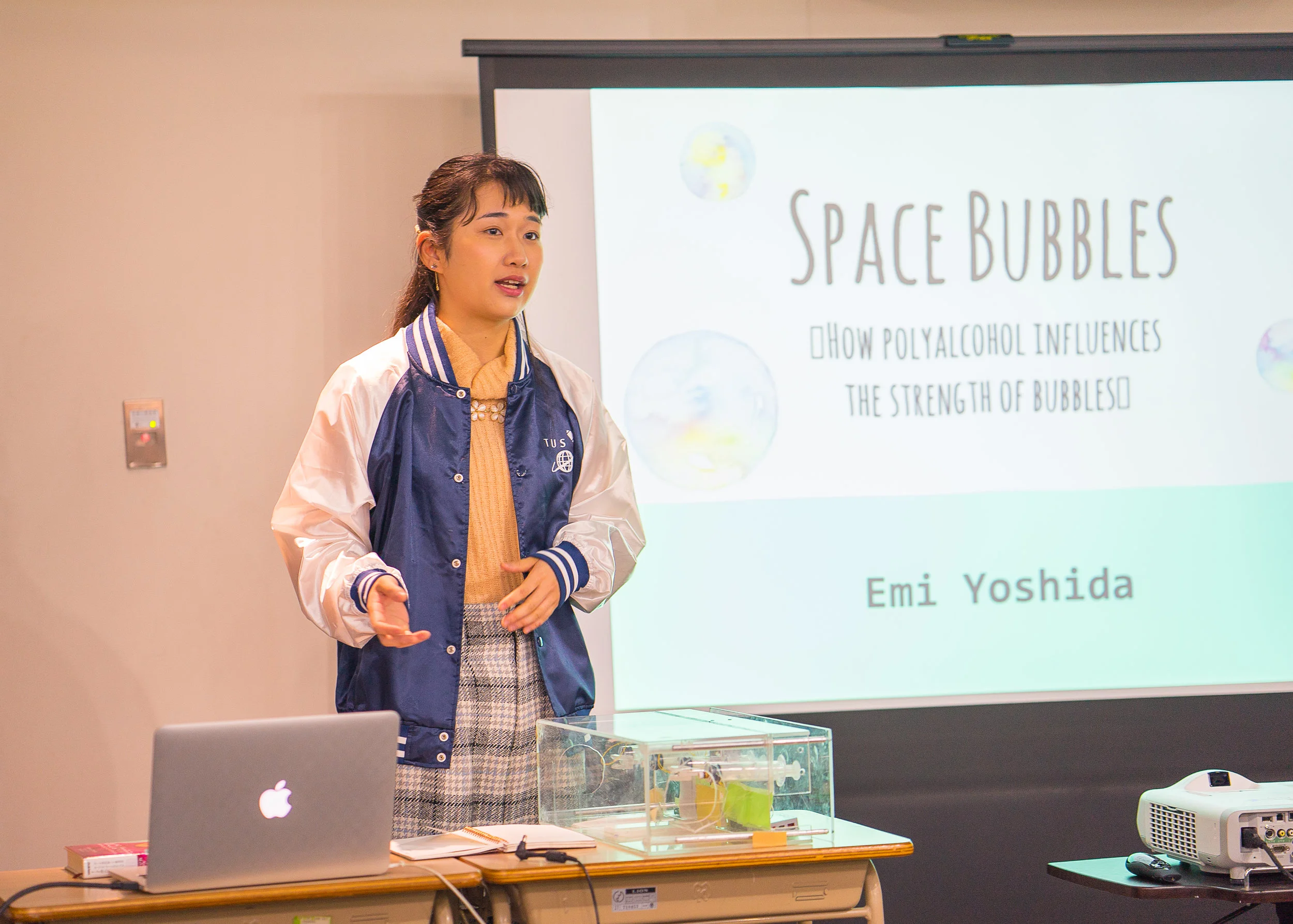Emiko presents findings from her team’s Space Bubbles experiment. (Courtesy of Amarachi Nwosu / Malala Fund)