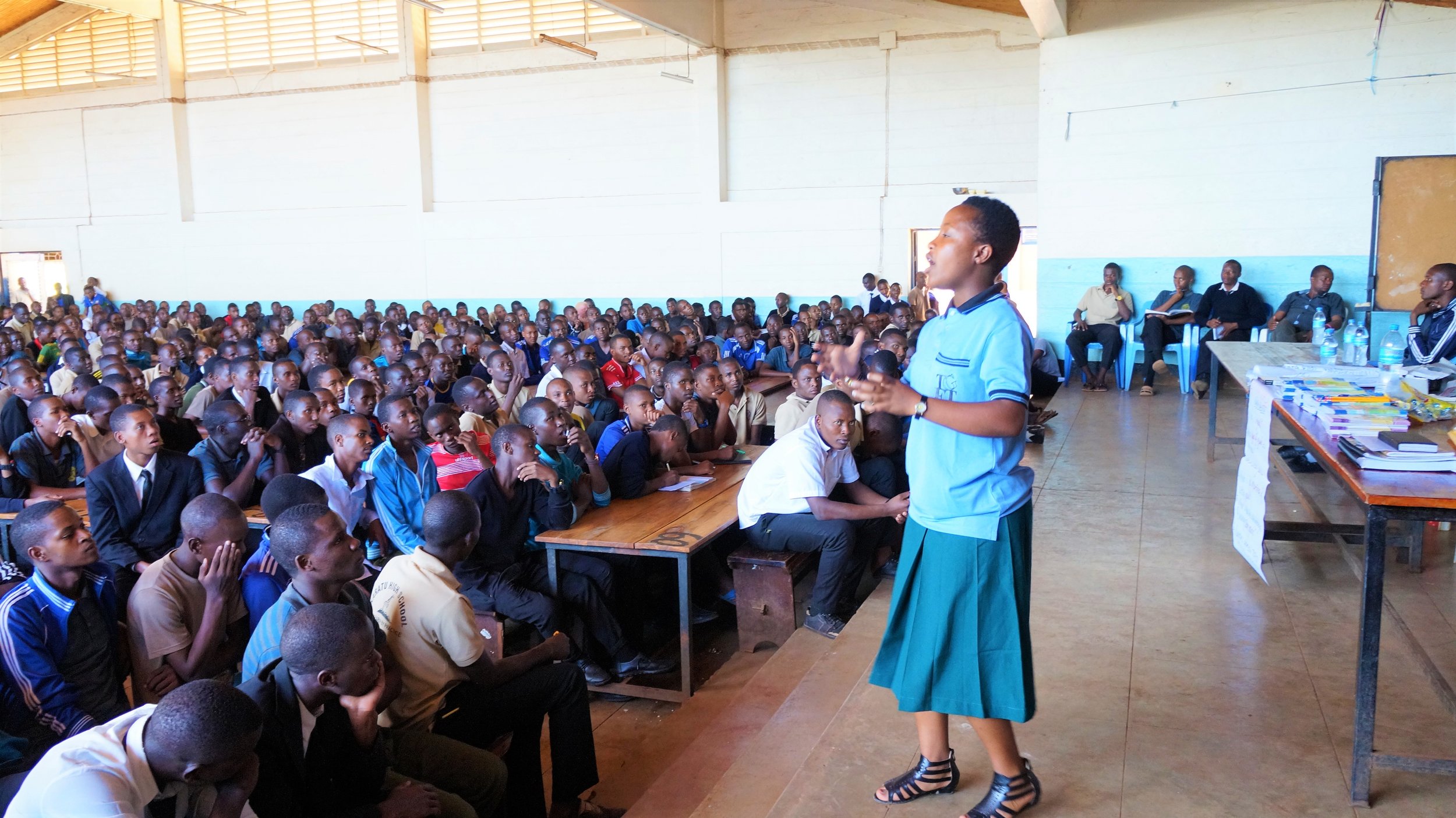 Melanie speaking about menstruation to 715 young men at Karatu High School. (Courtesy of Nano Chatfield / The Girls Foundation of Tanzania)