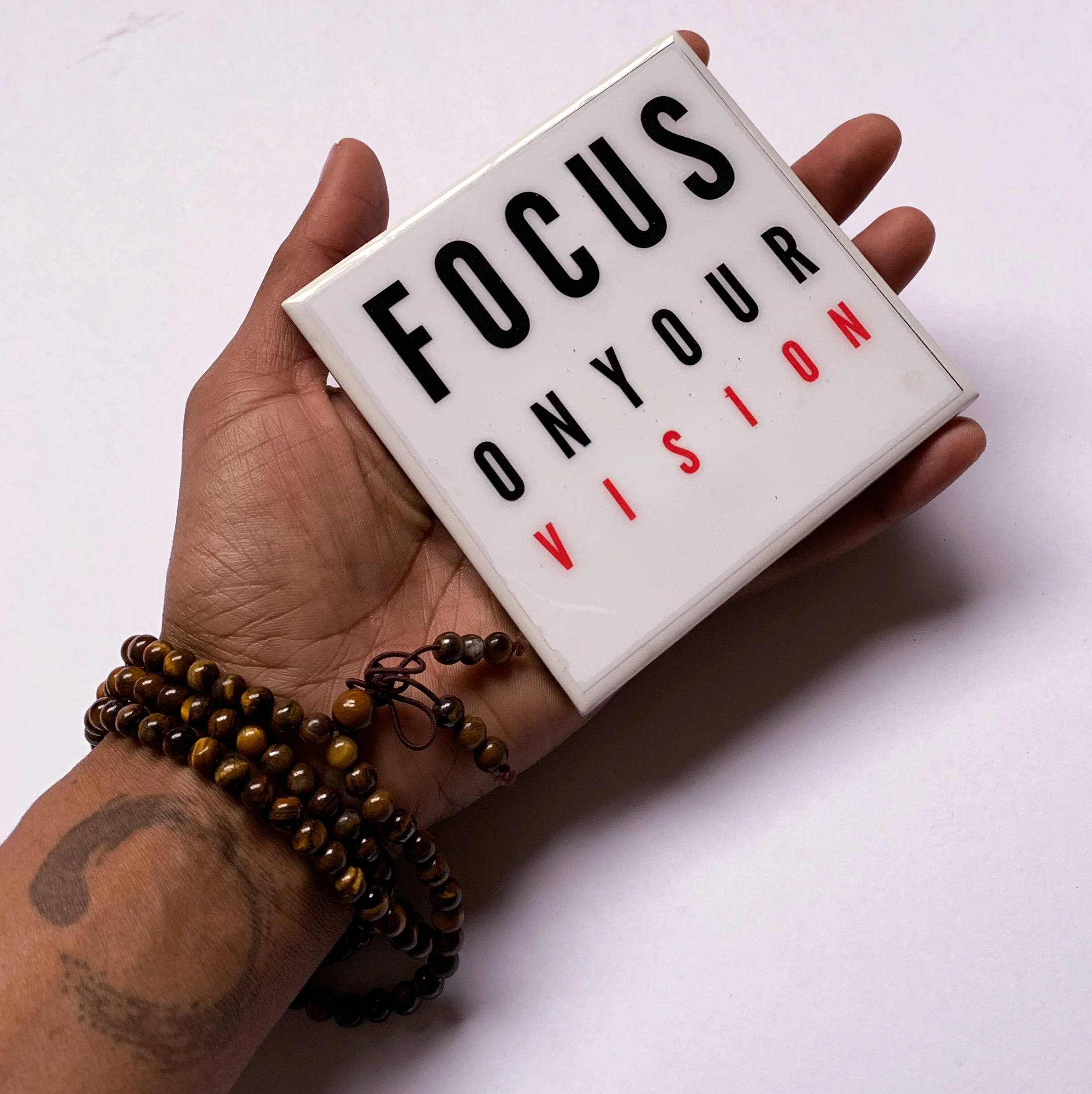 FOYV-Focus on your vision white handlheld flat.jpg