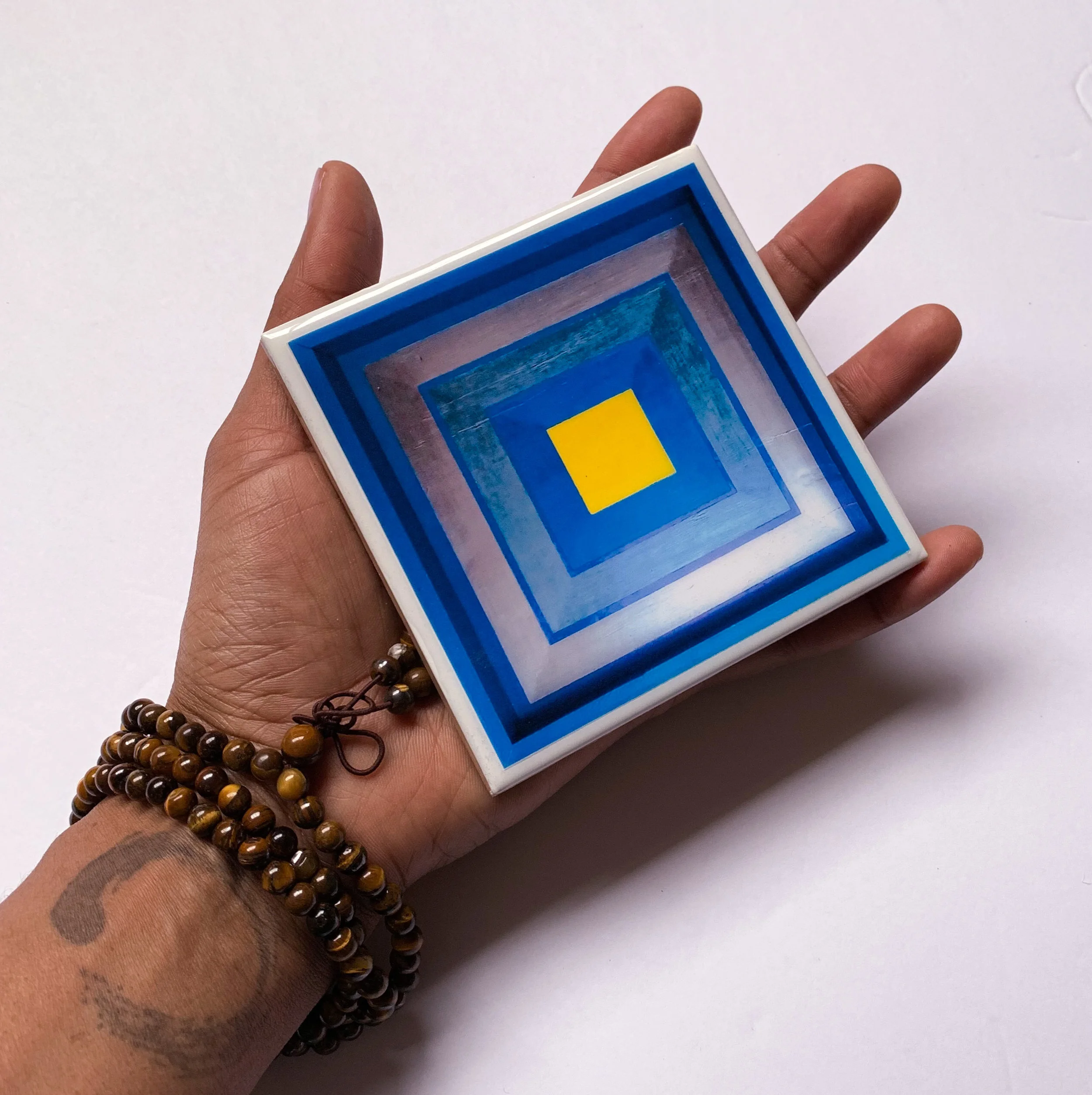 Geometric-Squared handheld flat.jpg