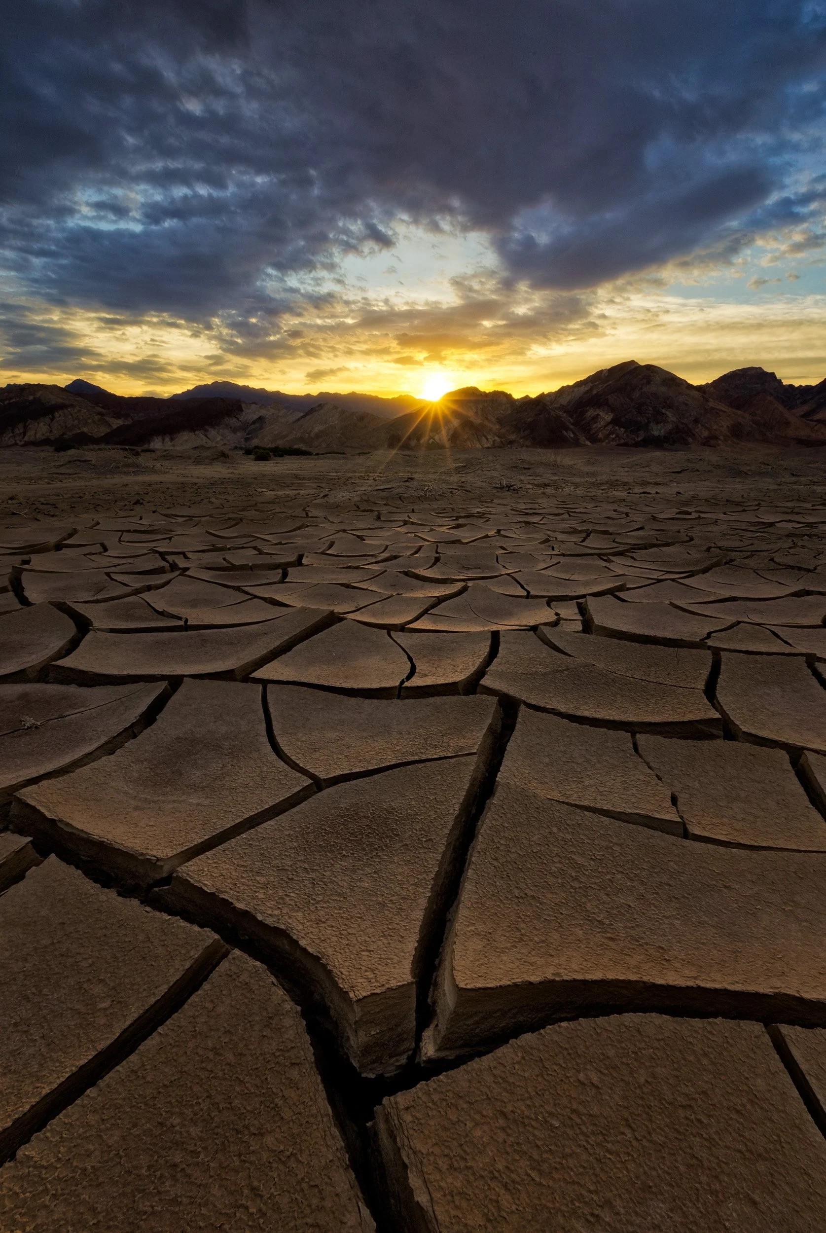 cracking-sunrise-vertical-death-valley-mud-cracks-fine-art-print.jpg