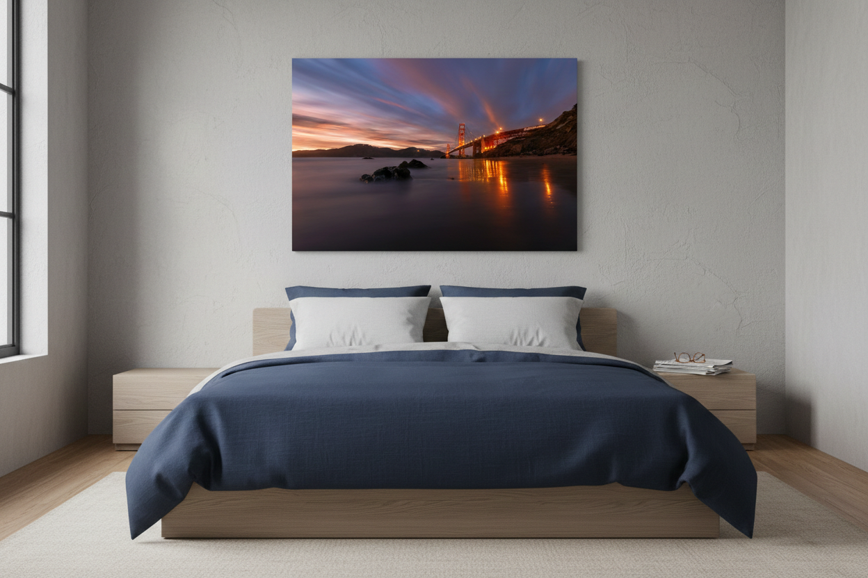 Golden Gate Bridge blue hour ocean print mounted over a platform bed with a navy blue duvet.