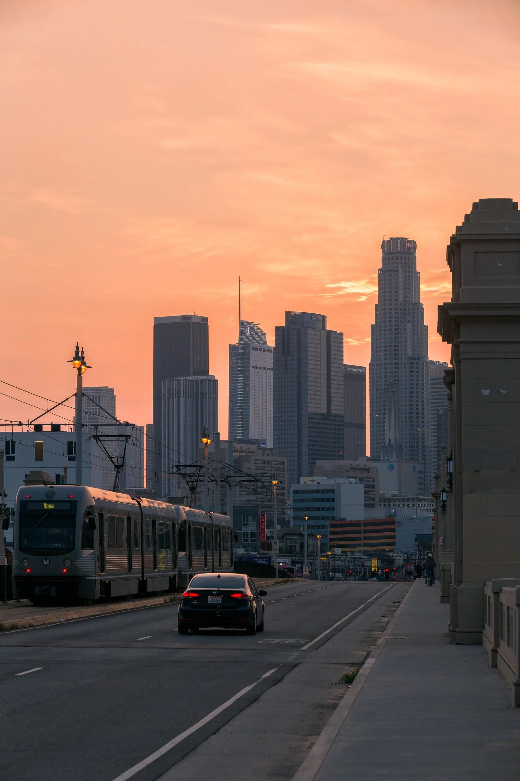 Downtown Los Angeles Skyline Sunset with Frozen Train and Traffic from 1st Street Bridge