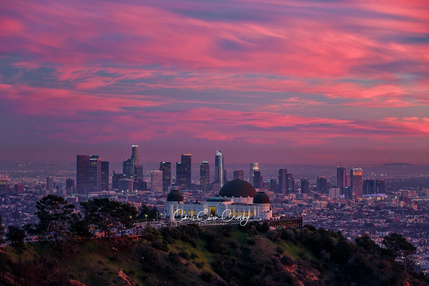 Griffith Observatory and Downtown LA skyline at sunset; 3:2 landscape photo with glowing city lights and twilight sky.