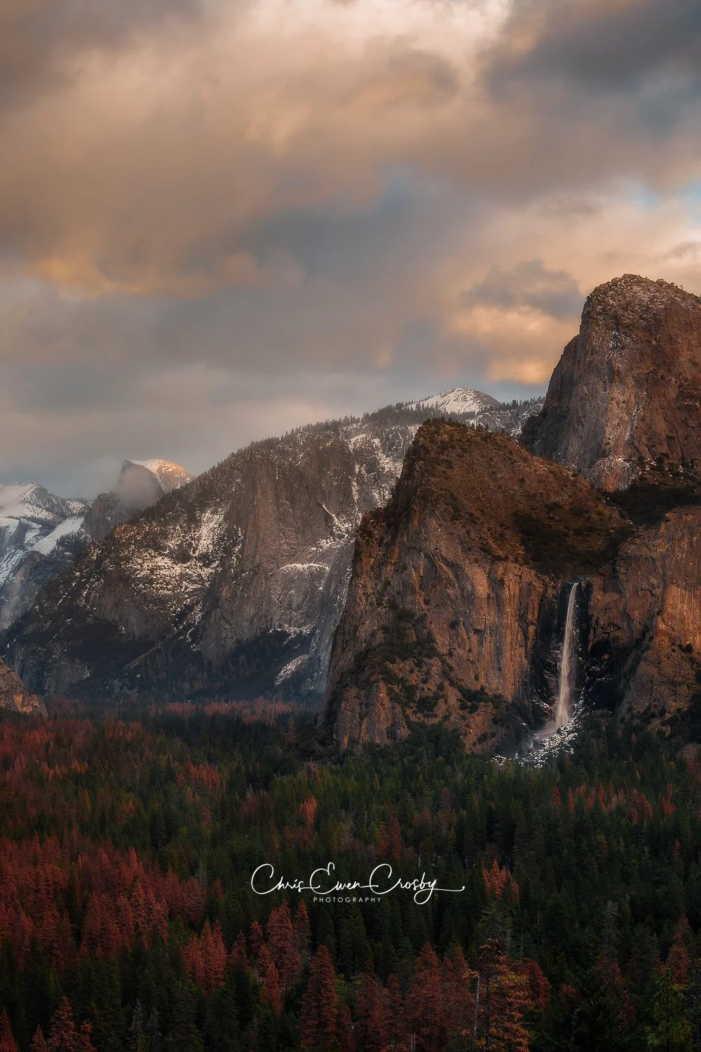 Vertical Yosemite Tunnel View sunset; dramatic golden hour light hitting El Capitan and the valley floor in 2:3.