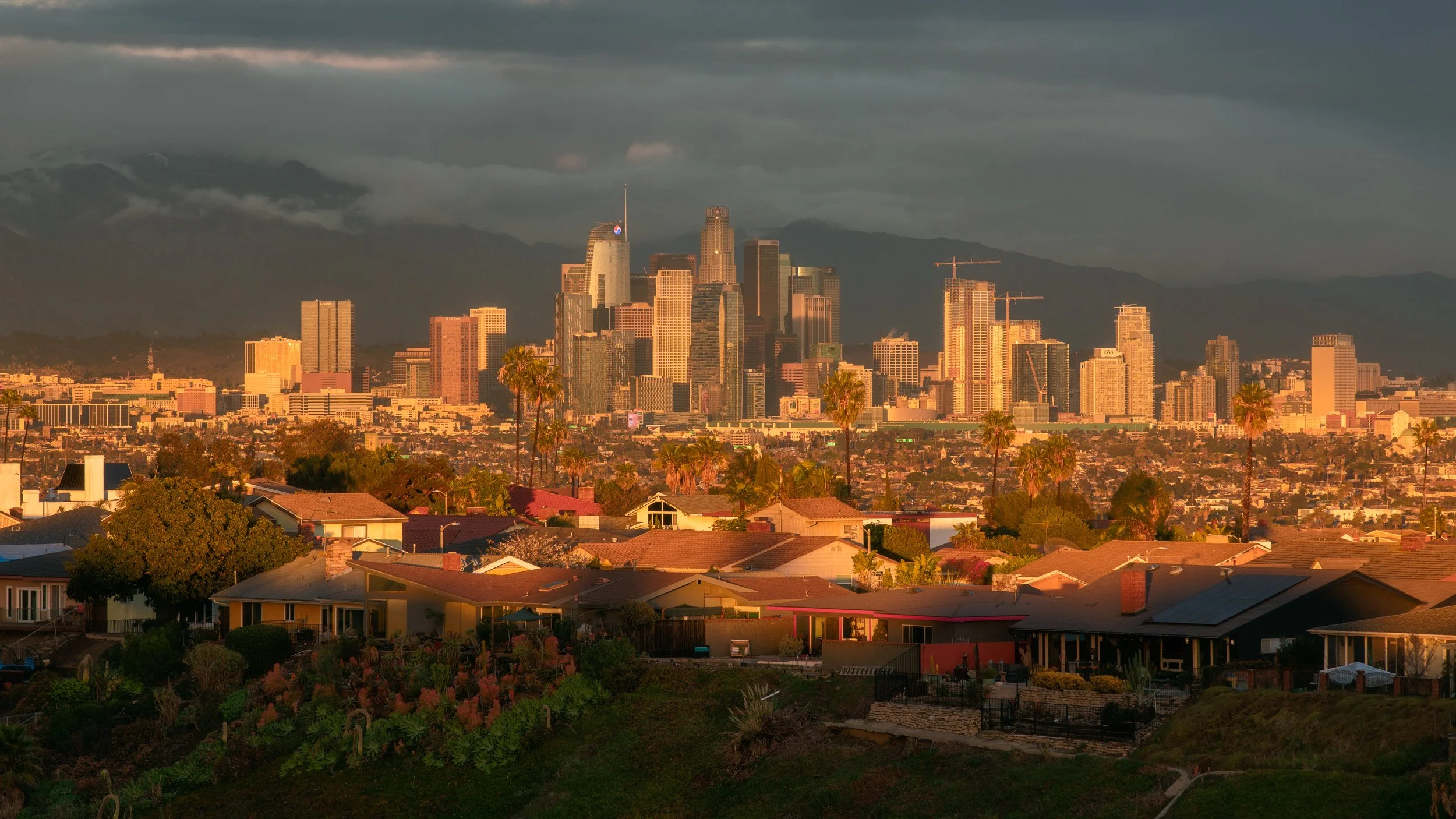 Dramatic golden hour view of the Los Angeles Skyline after a storm