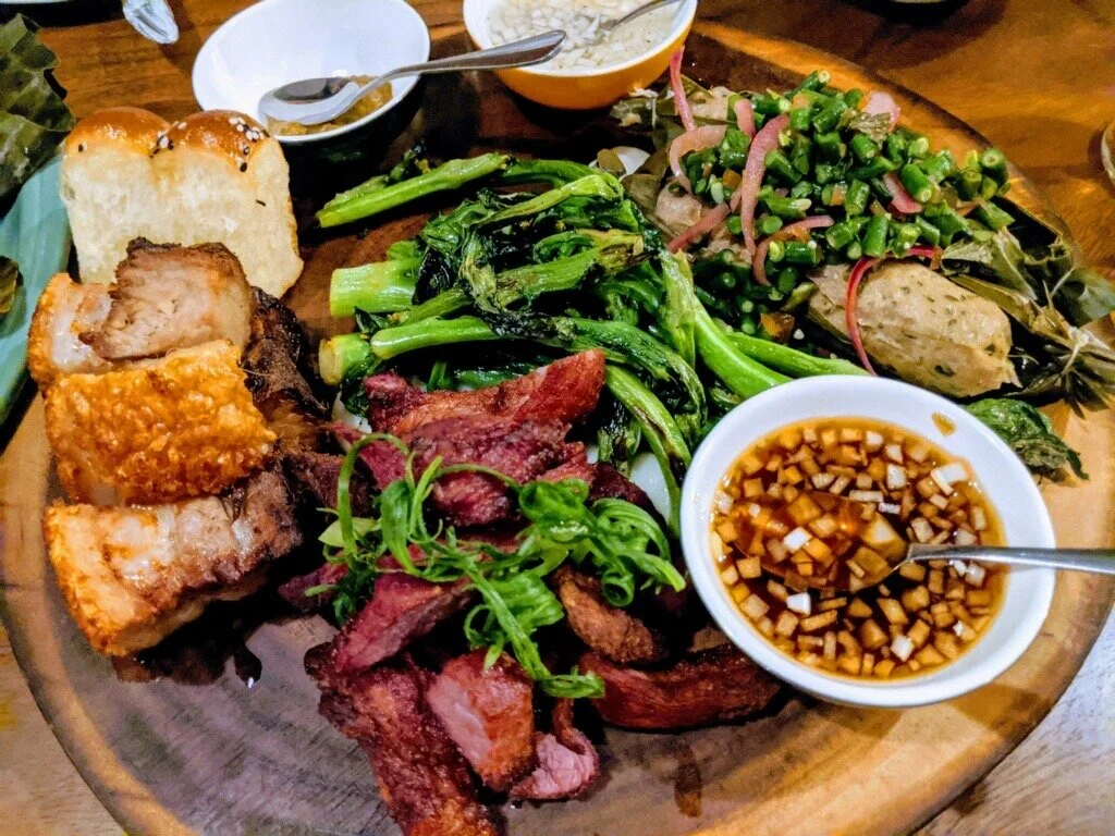 Prubechu platter spotlighting Chamorro food in all its glory. Takeout currently on hold, consider a gift card.