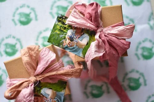 gift wrapped box with naturally dyed silk ribbon