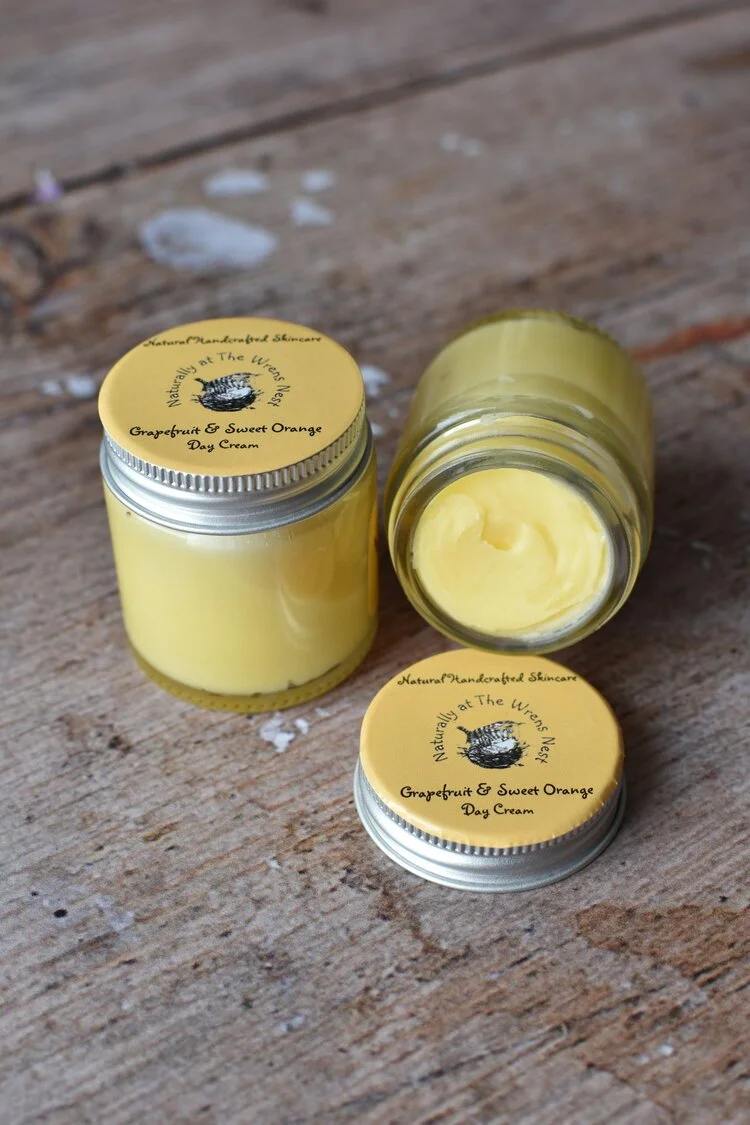 An opened pot of Grapefruit & Orange Daycream facial moisturiser from Naturally at the Wrens Nest