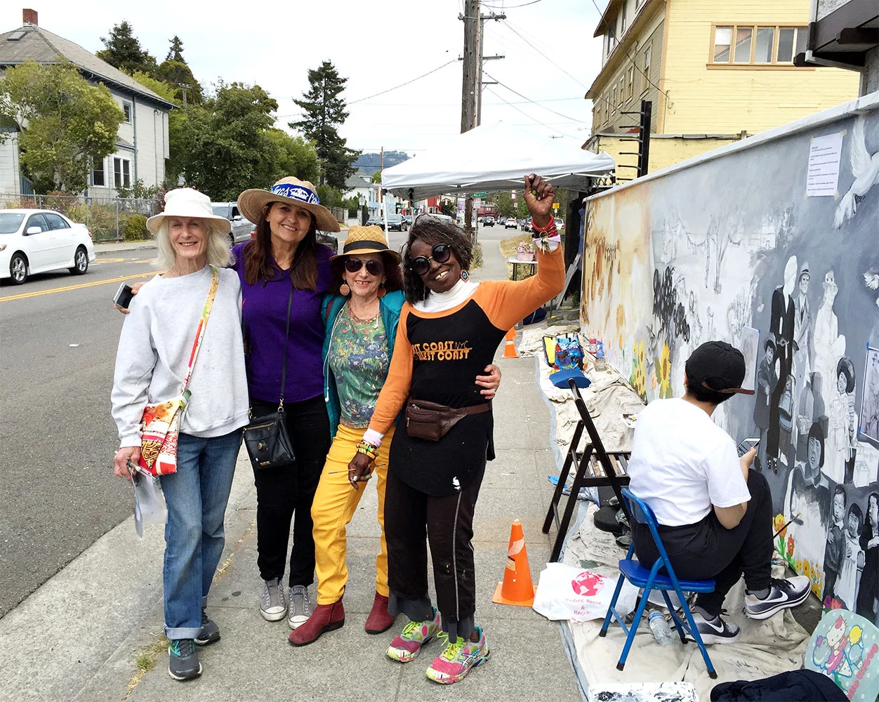 The Invisible Becomes Visible , South Berkeley Community Mural. From left to right: Edythe Boone, director, Miranda Bergman, Tammy Artis, Jane Norling. Painted by local unshelterd residents, neighbors, school children, muralists. Berkeley, California, 2018.