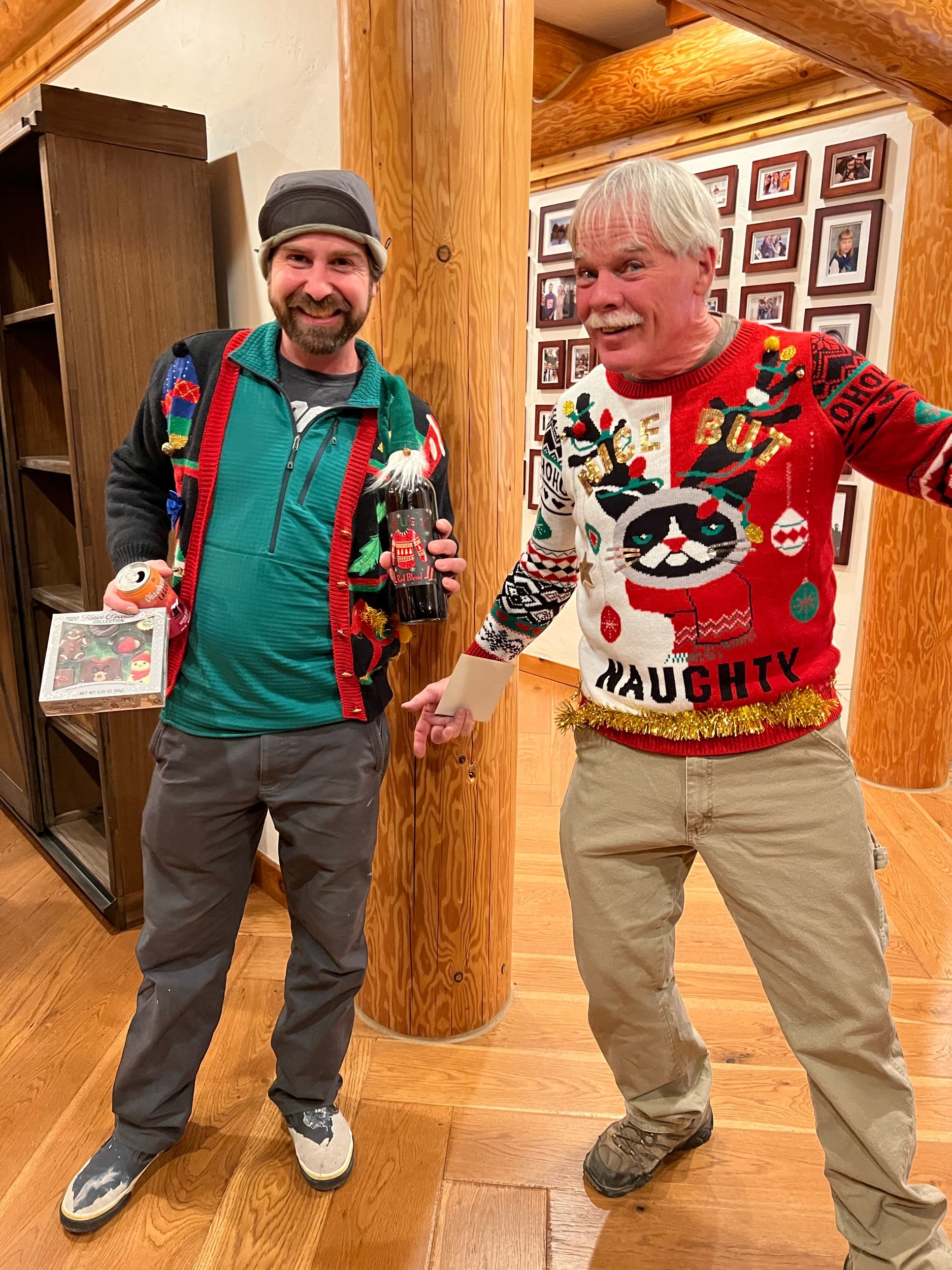  Nate (painter) and Eric Olsen, (log fireman). Ugly sweater contest winners, 2022. 