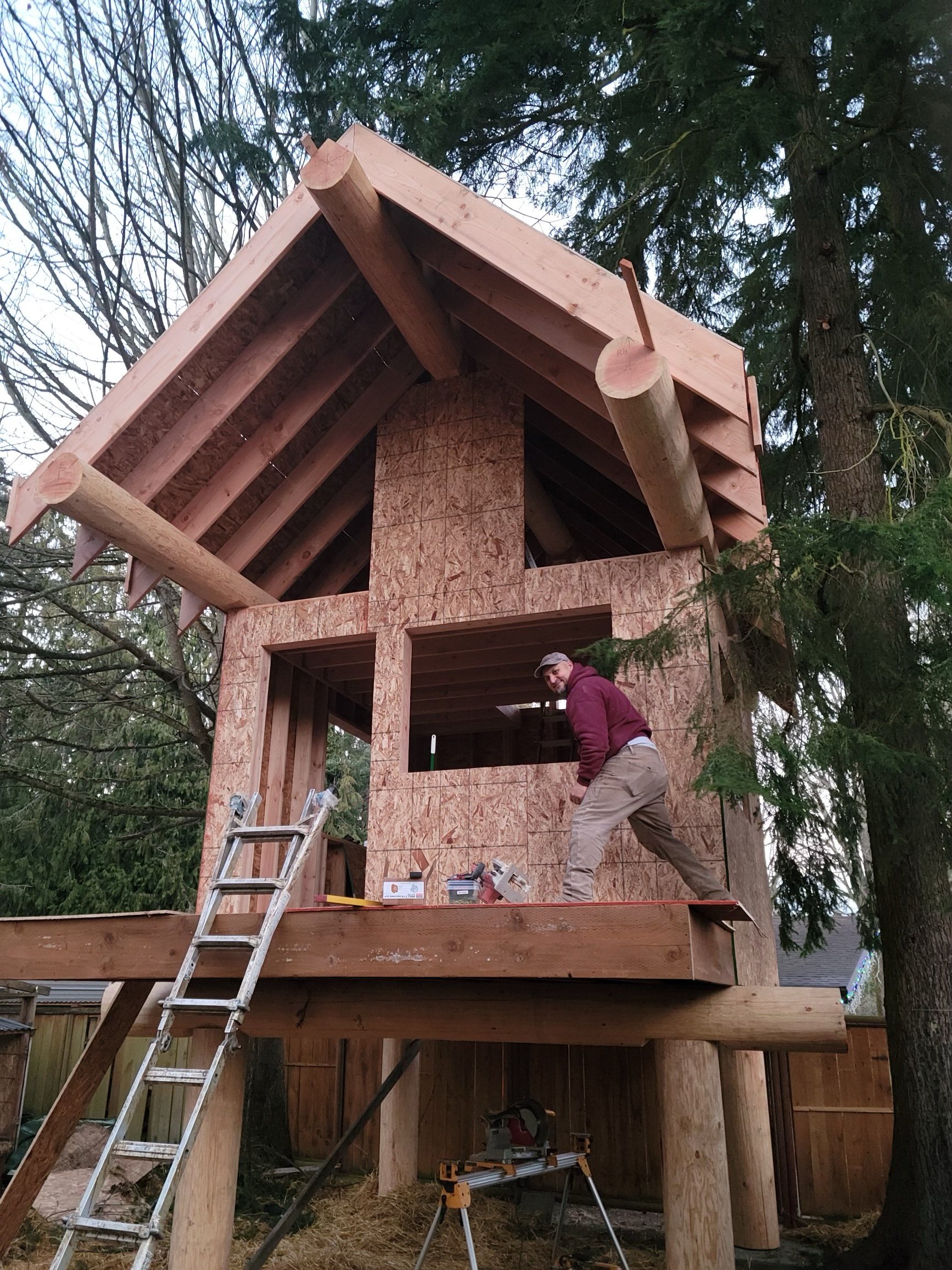  Elise working on kids playhouse/treehouse. 