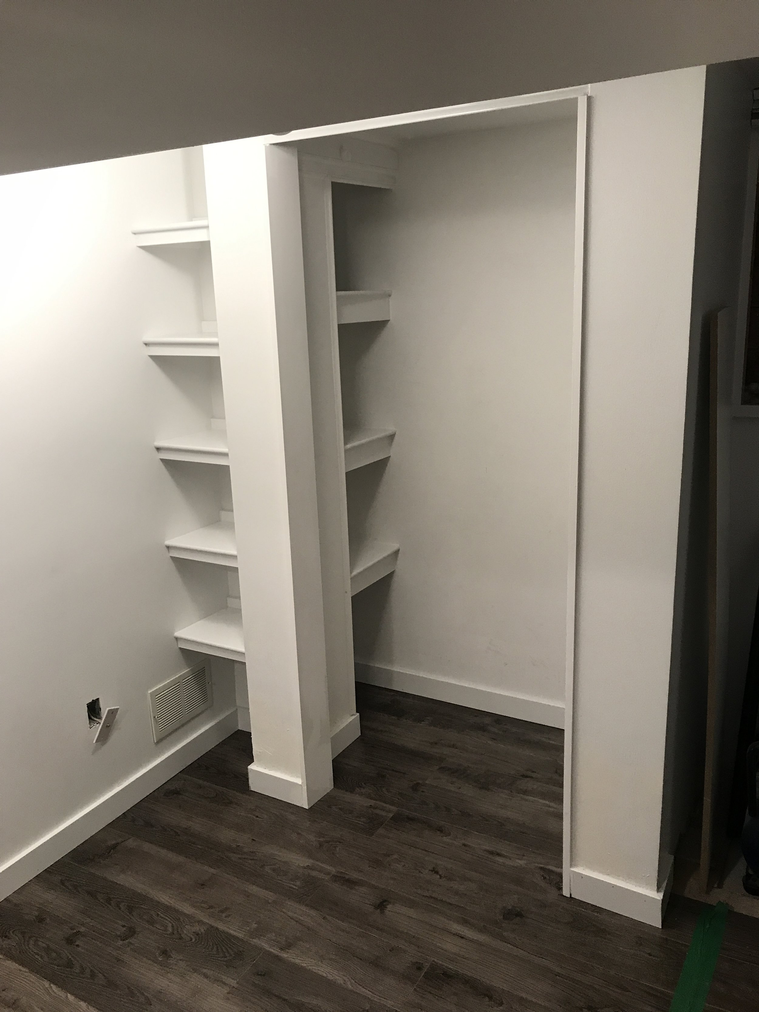 NY Bsmt Custom Blt Bdrm Closet w Shelving - After.JPG