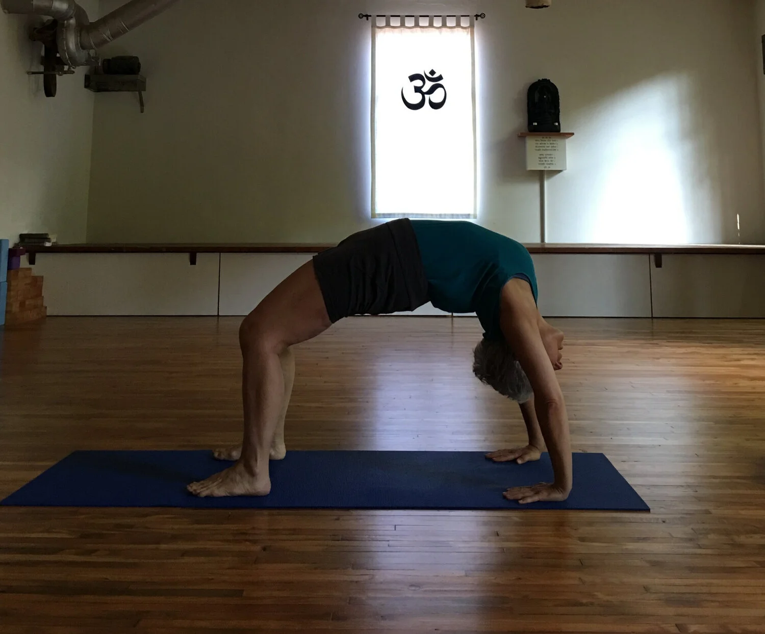 Me at 65 in Urdhva Dhanurasana