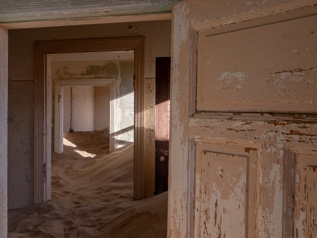 Doors, doors and more doors in Kolmanskop, an abandoned mining town