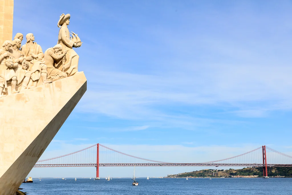 The Monument to the Discoverers with the bridge linking the south bank to Lisbon
