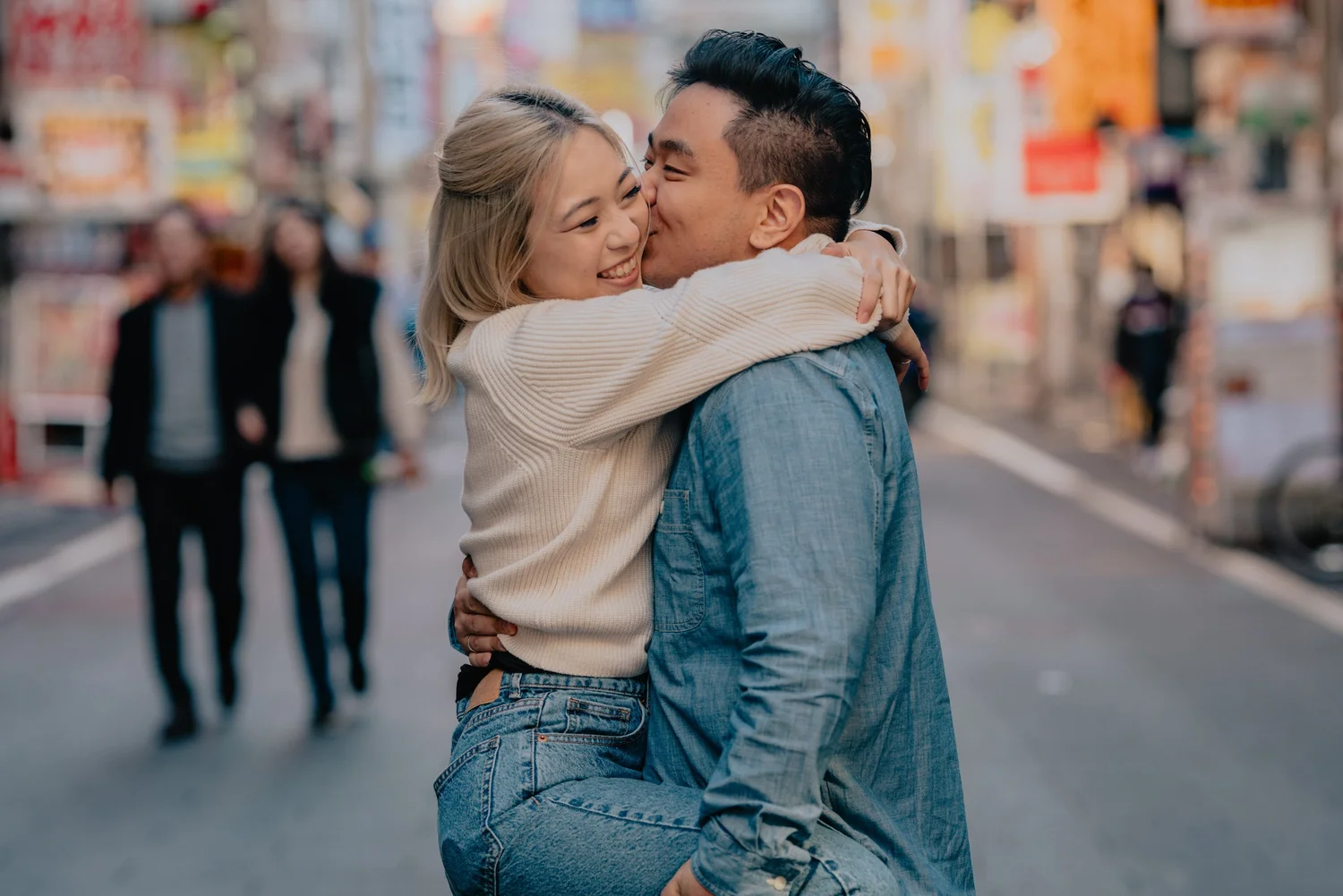 A couple embracing during a Tokyo street session
