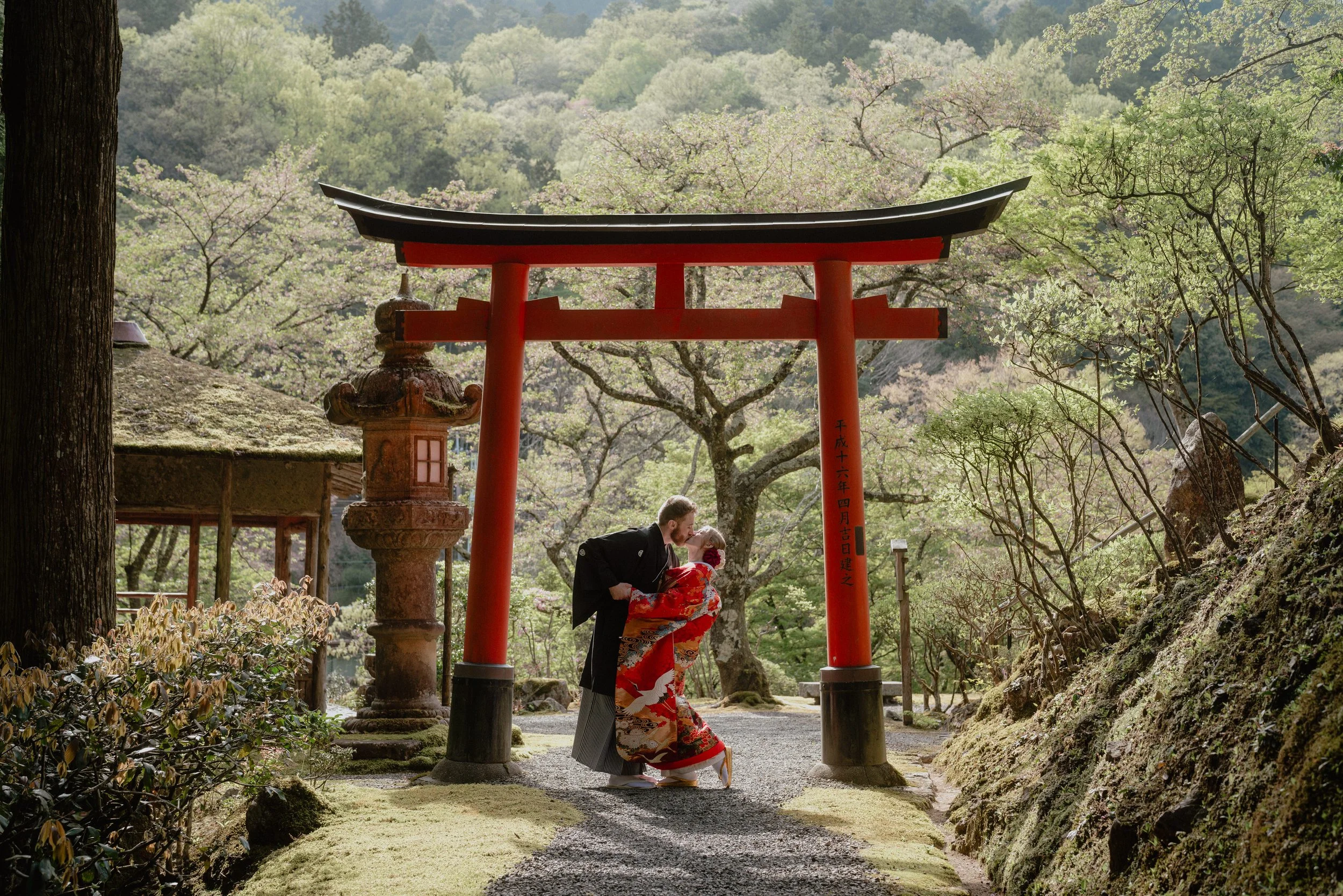 An elopement couple at a shrine