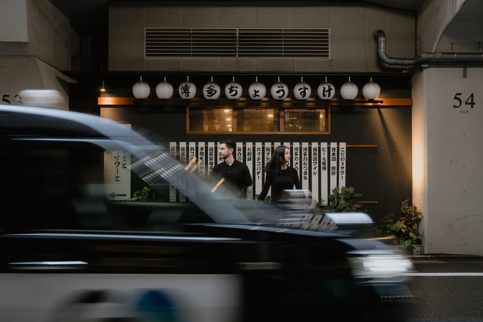 A newly engaged couple photographed together in Tokyo