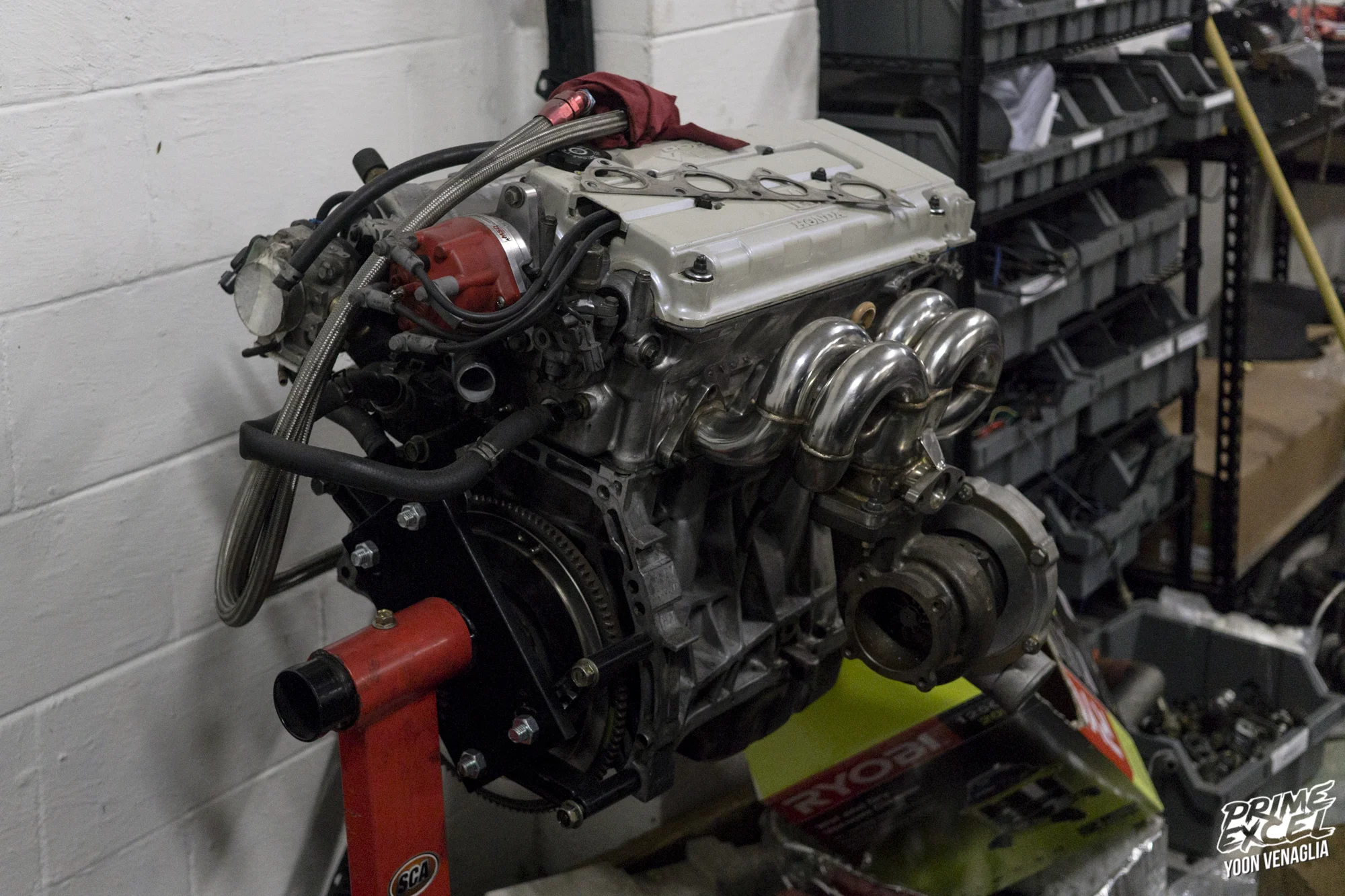 Jackson racing supercharger hanging off the back with a turbo up front