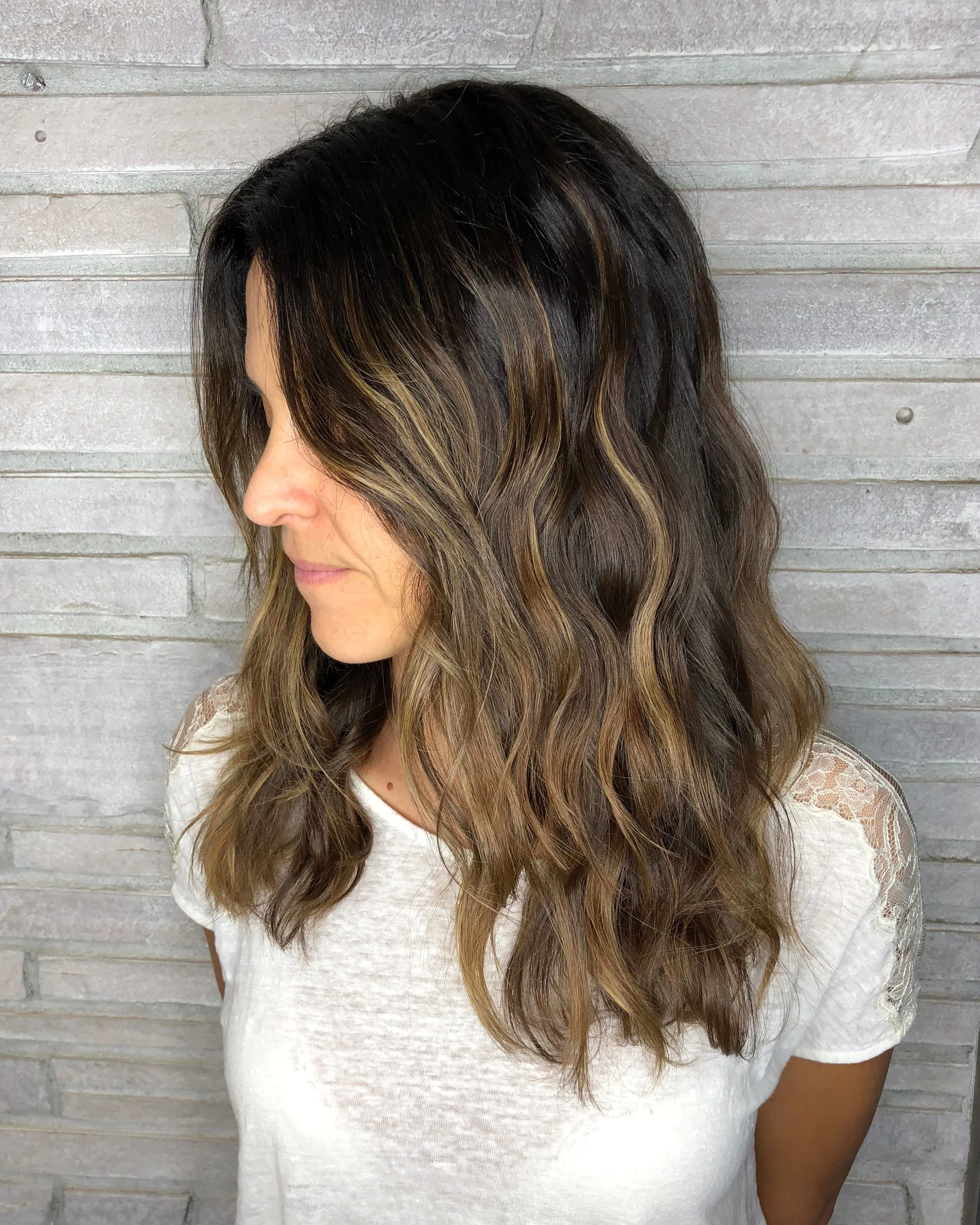 This look was created using hand painted highlights and colormelting with Davines Mask with Vibrachrom haircolor.