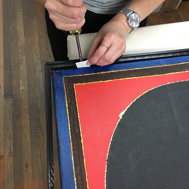 Quite honestly we weren't so happy about removing the original frame off of this S.H. Raza painting, but the client is always right...right? 🤷🏻&zwj;♀️🤷🏻&zwj;♂️ #archivalframing #fineart #painting #shraza