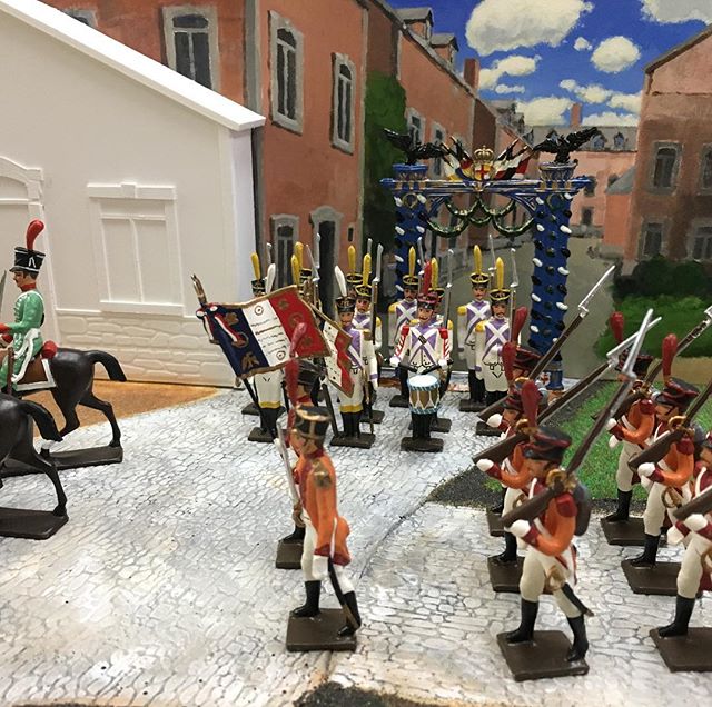 We've reopened after a month-long summer vacation and we're back to....playing with toy soldiers. We're almost done painting the background for this diorama we built. Thoughts? #fineart #WIP #toys