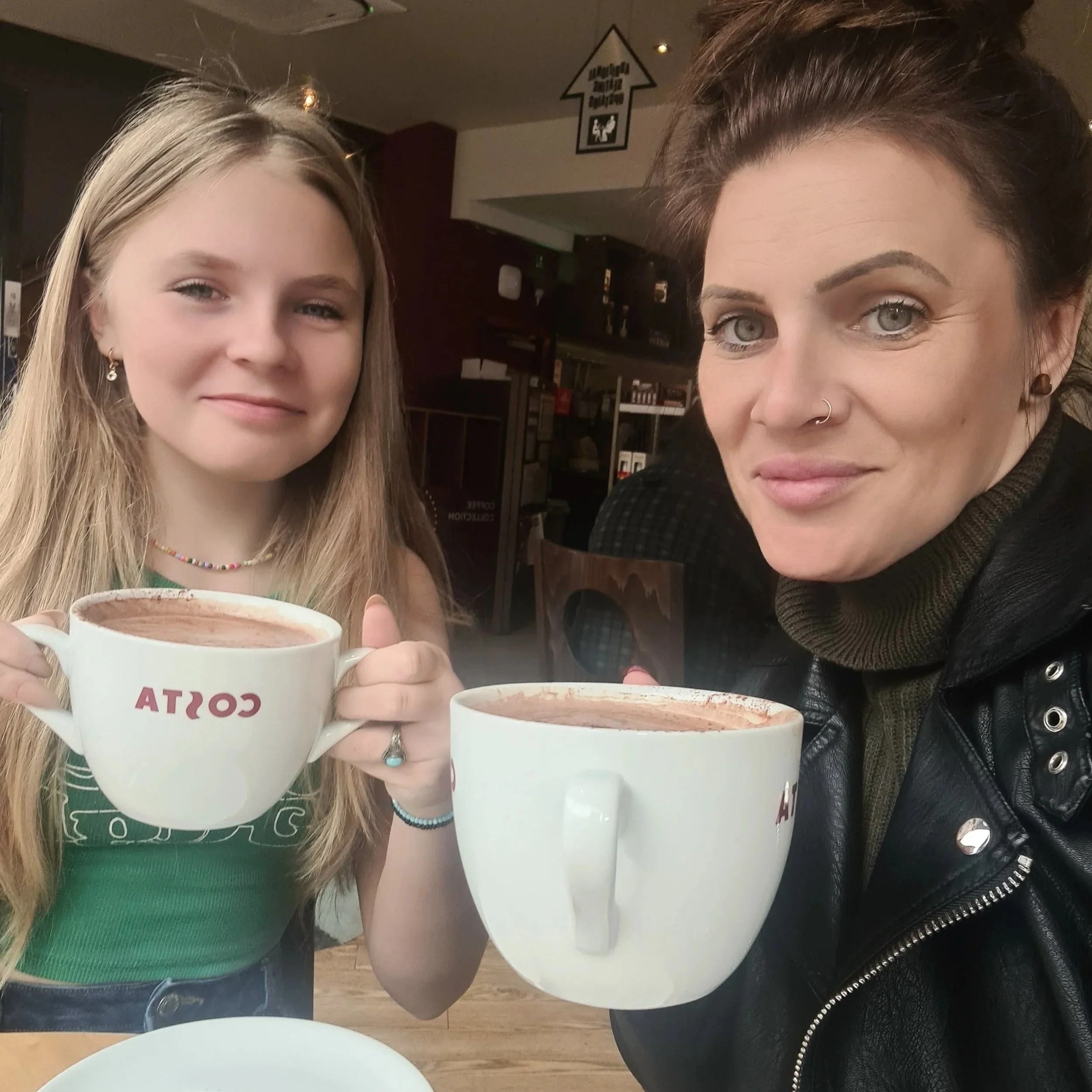 Joanne and her daughter in a cafe following therapy with Sense-Ability