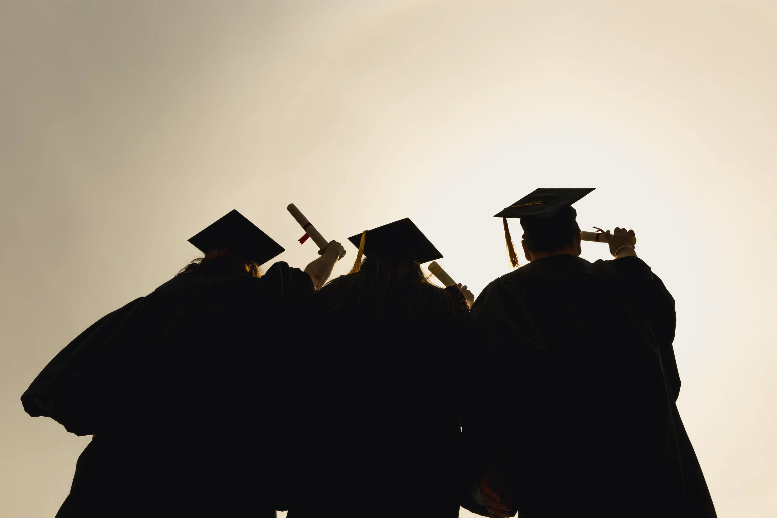 silhouette-of-three-grad-students_4460x4460.jpg