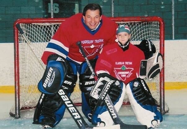 Neumann (age eight) and Tretiak pose at her first training camp in Toronto.