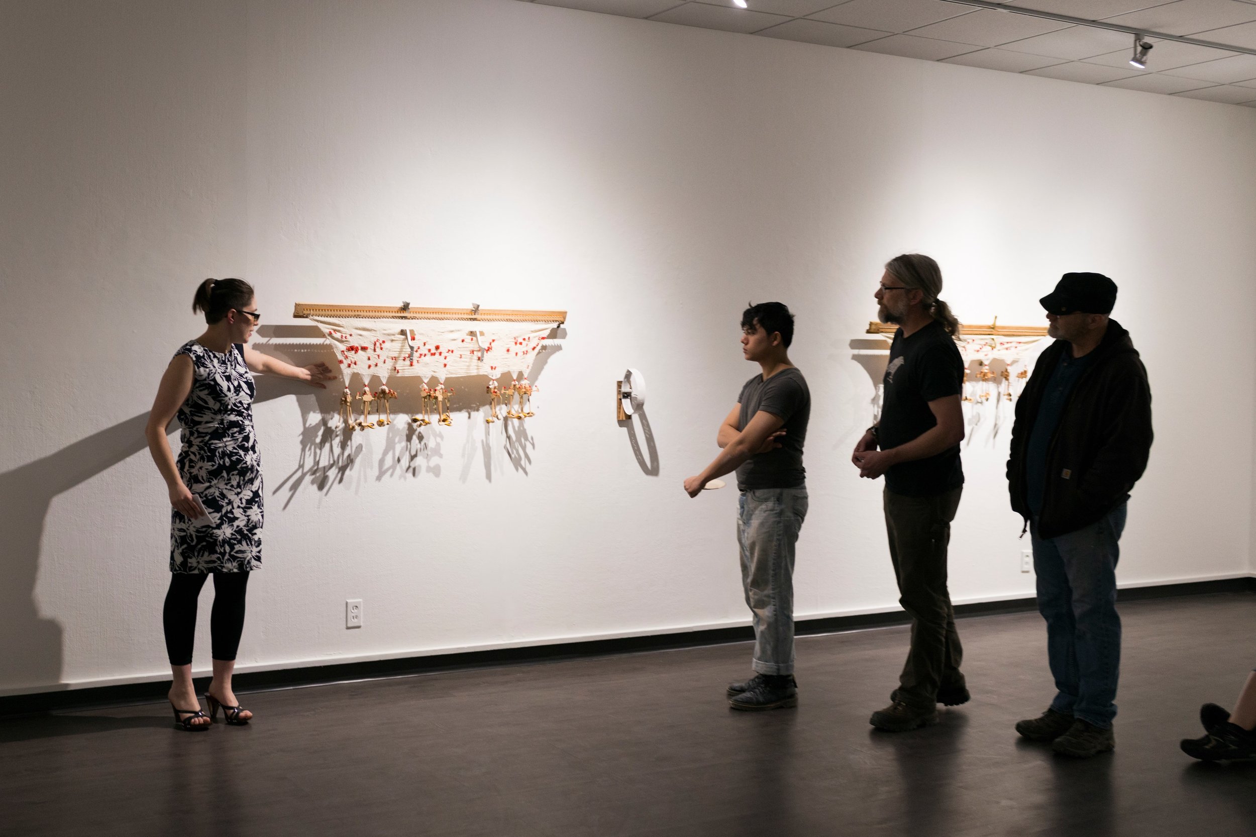 Erin King delivering her artist talk during her MFA Solo Exhibition, Musica Universalis .