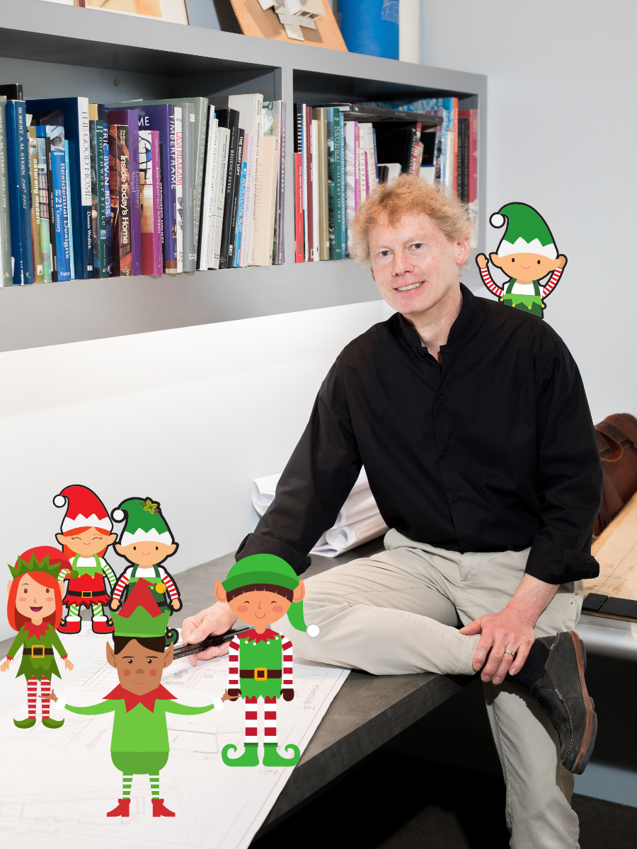 Santa’s Helper, Bradford Bond, working with the Elves to finalize the workshop floor plans.