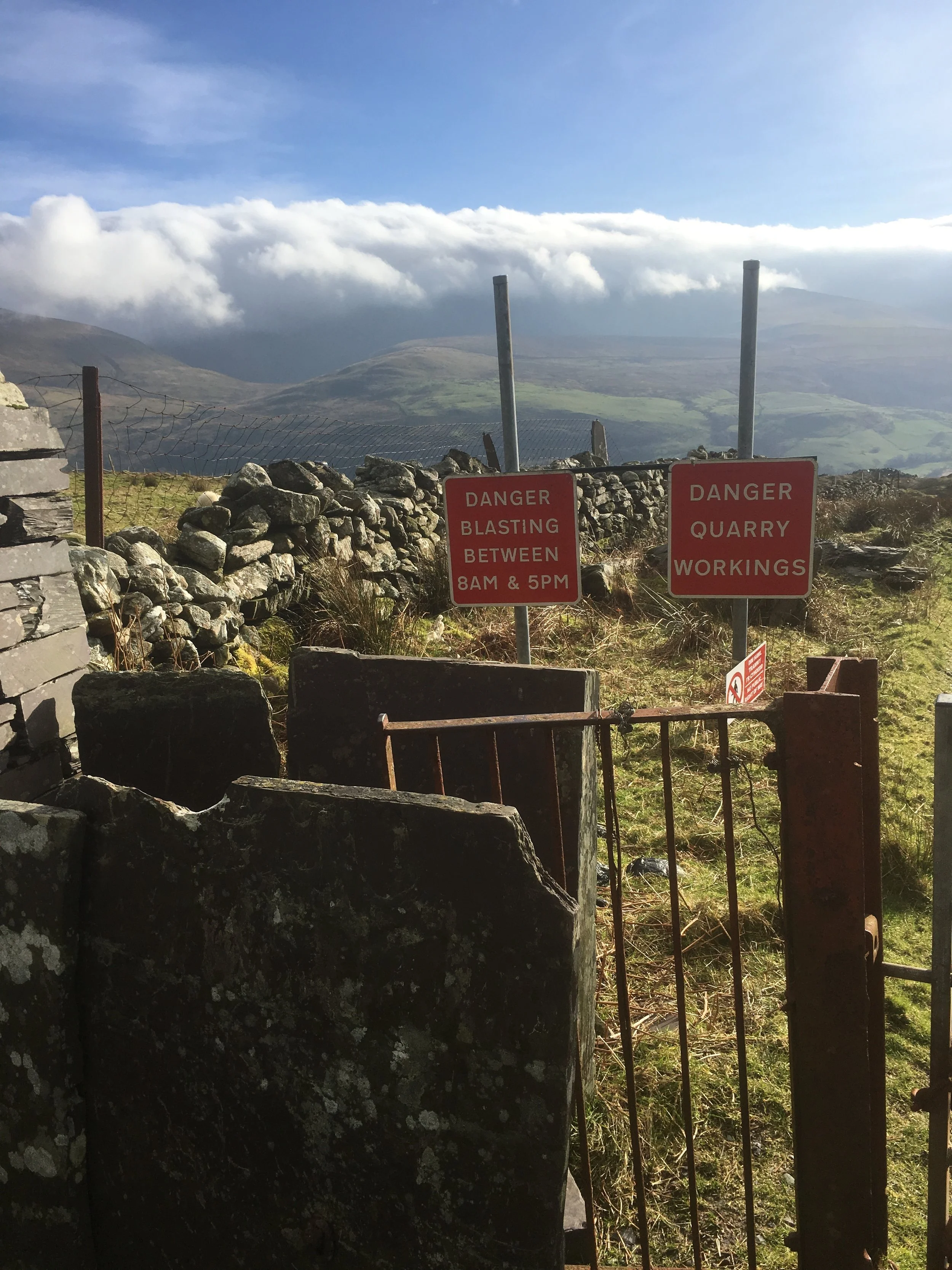 ‘Entrance’ into Ellen Quarry in Y Fron, complete with no entry and warnings of blasting