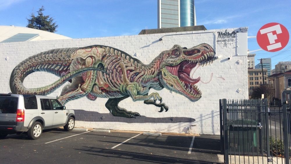 Oakland Flax’s new mural by Nychos greets customers in the parking lot.