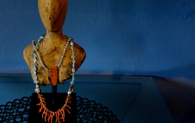 coral necklace on head.jpg