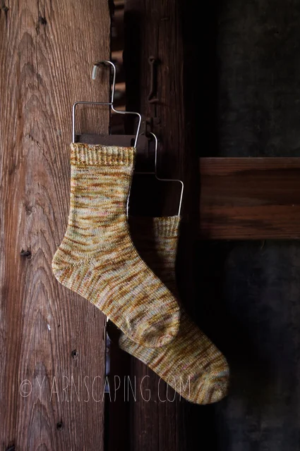 Vanilla Socks; Yarn by Voolenvine Yarns in “Figbash” on Footsie