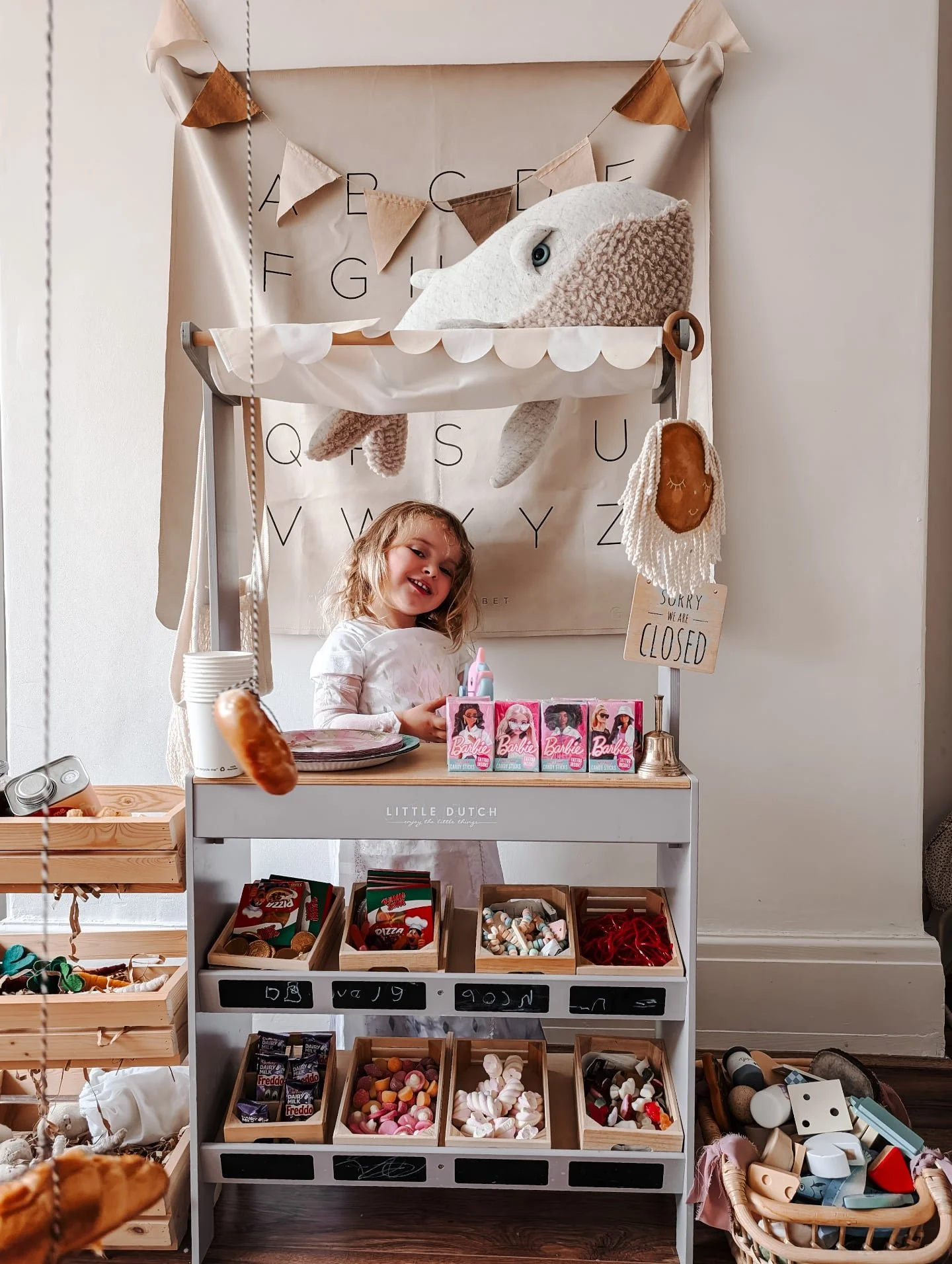 Filling this toy shop with wrapped chocolates, bottled drinks, popcorn, snacks and cinema style pick and mix has to be one of our favourite family traditions.
•
Almost every month we host 'cinema club' at home with the girls... we make them wait
