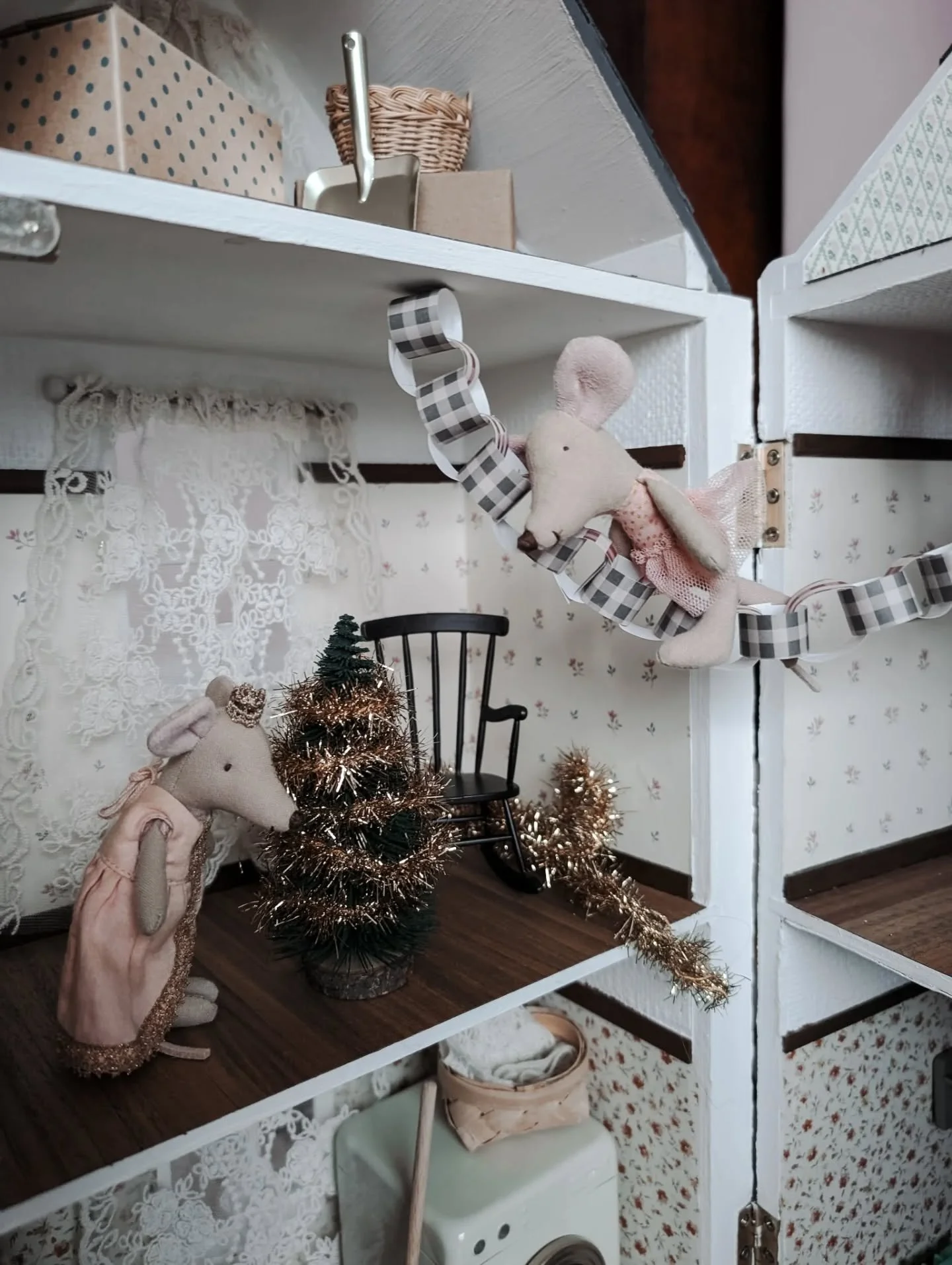 The mini houses in our home need un-decorating too.
So little mouse sized boxes are coming out and miniature tinsel is being bundled up by teeny tiny little hands. 
Down with the wee paper chains, until next time.
So much magic in these little walls.