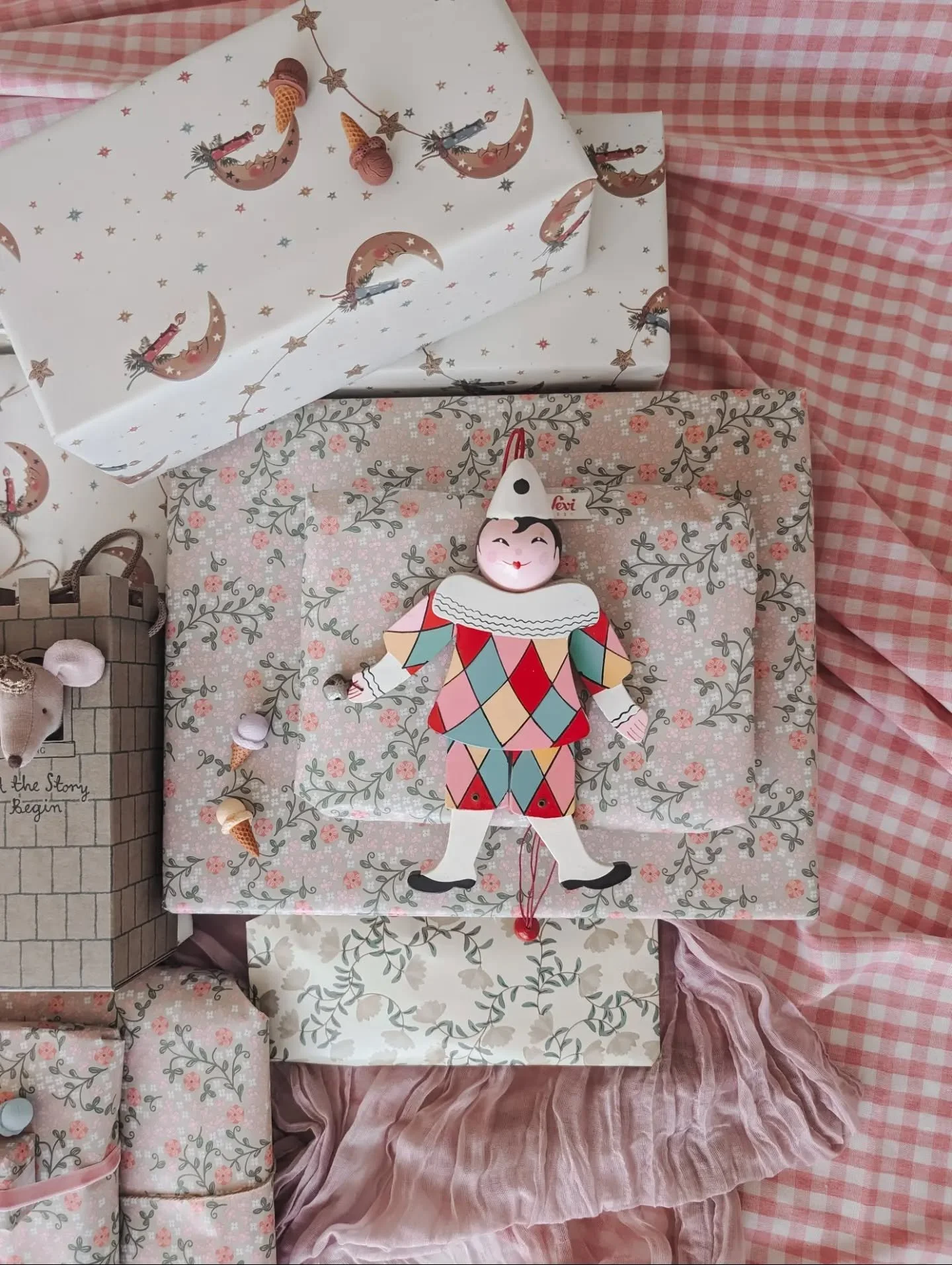 All the parcels have been wrapped with care, tied with neat little bows and stacked in tidy piles.  Surrounded by balloons puffed up by her sister (who got to stay up late) and a daddy who couldn't love her more. 
The tables laid ready for ice cream 