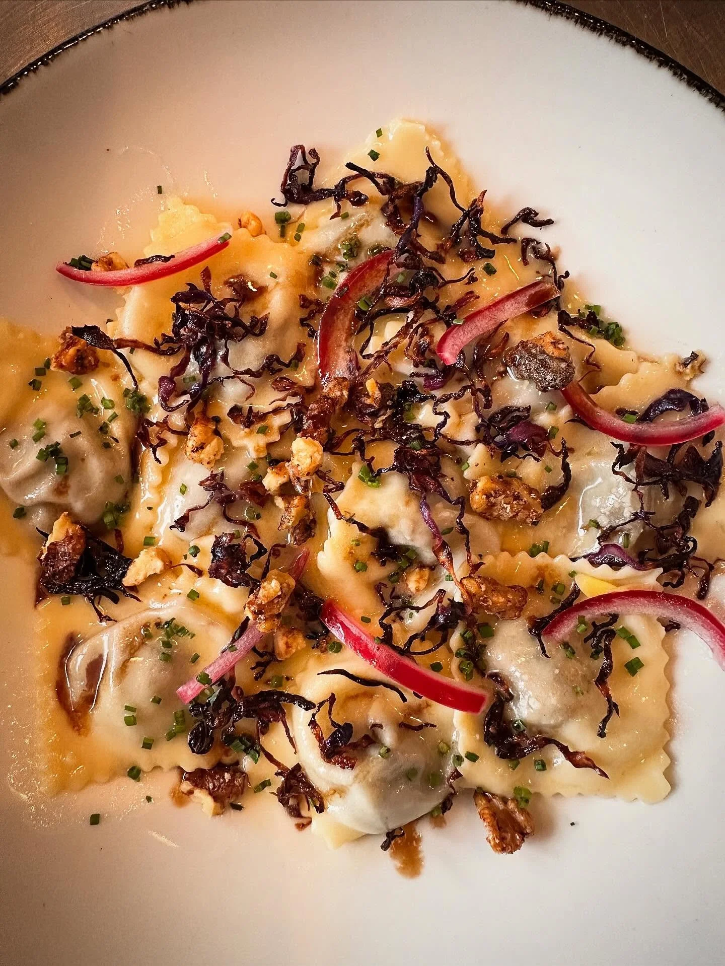 💥new dish drop! Short Rib Ravioli with crispy caramelized red cabbage, smoked walnuts and saba! Counting down the days till spring produce hits so try it soon!
