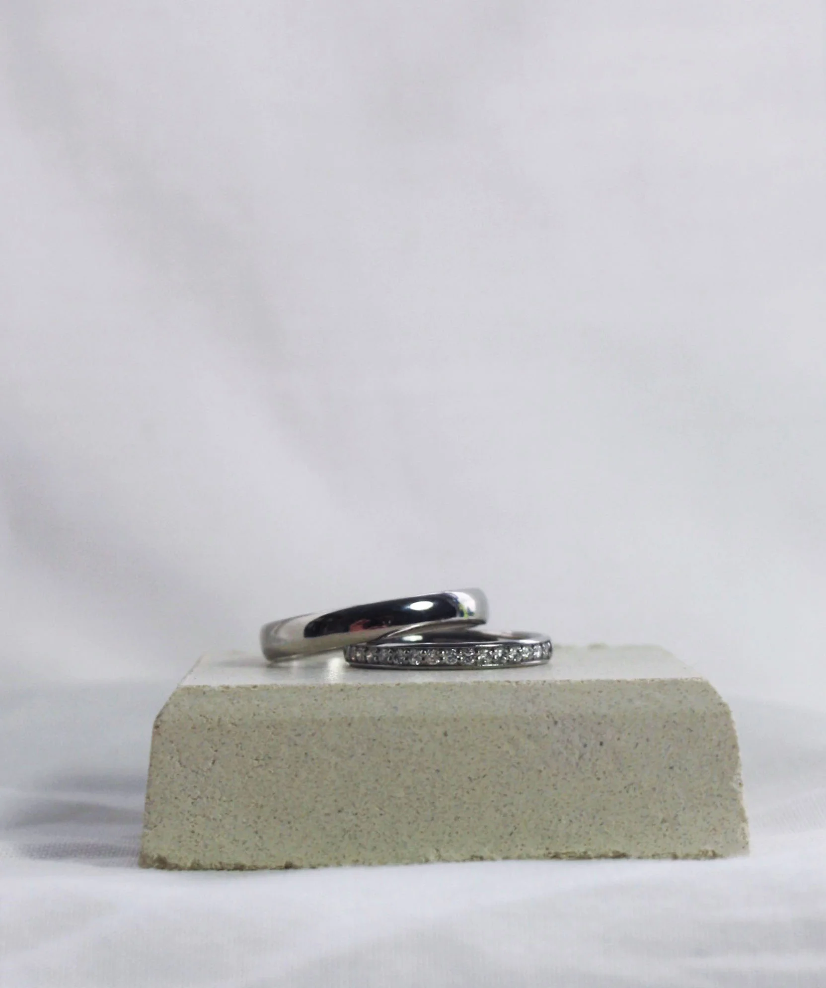 Palladium wedding band with platinum half eternity ring ed.jpg