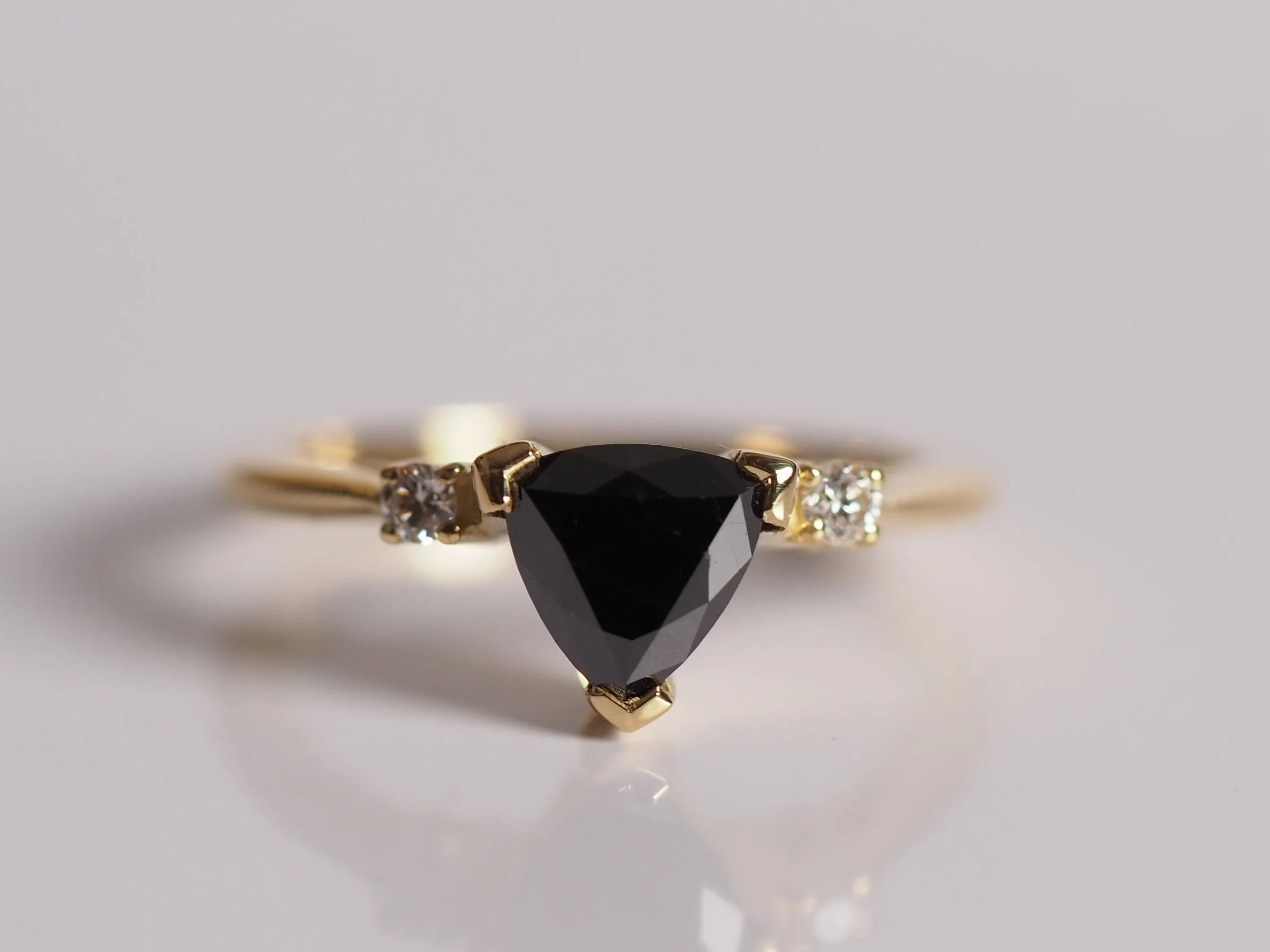 yellow gold black diamond ring