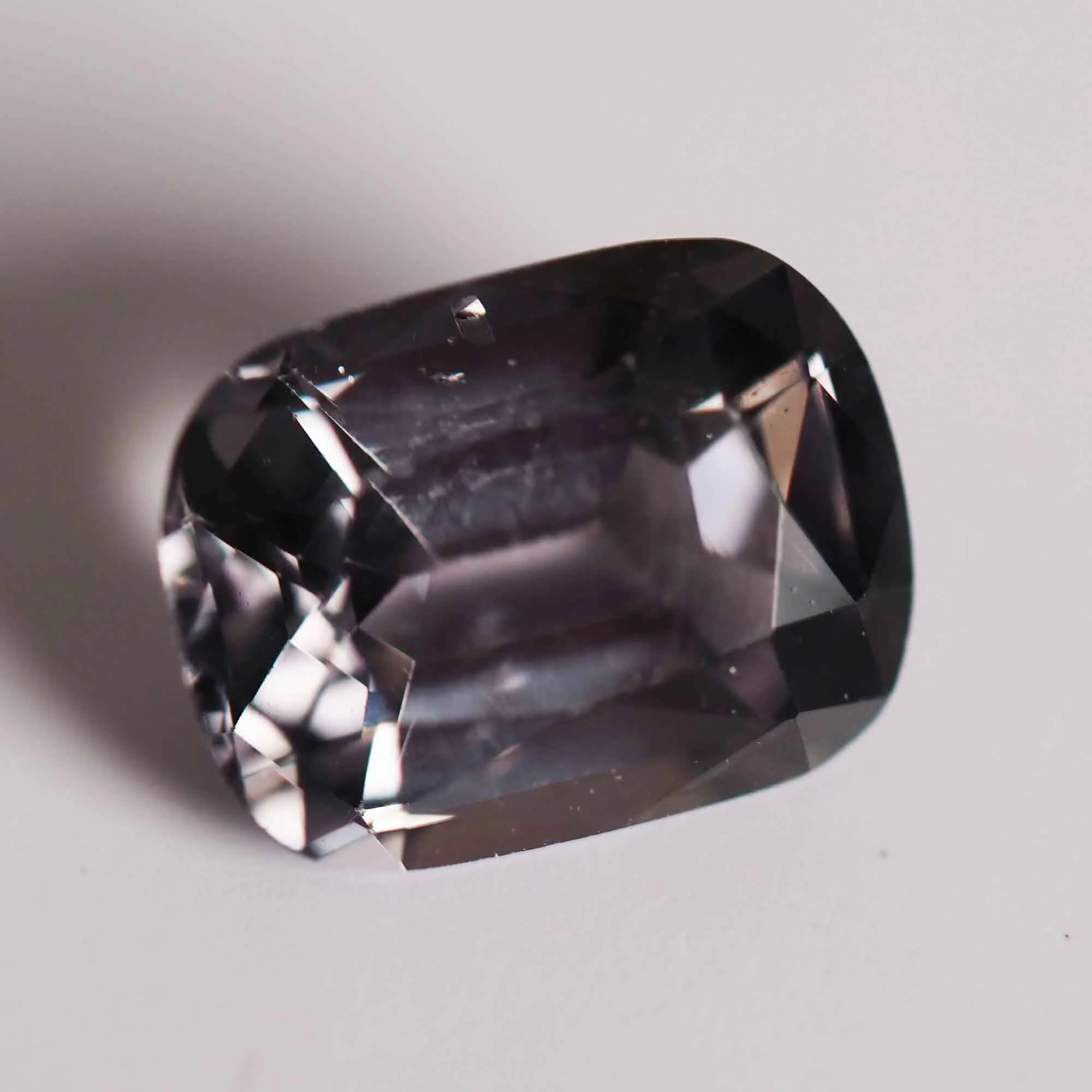 Grey purple spinel gemstone photograph.jpg