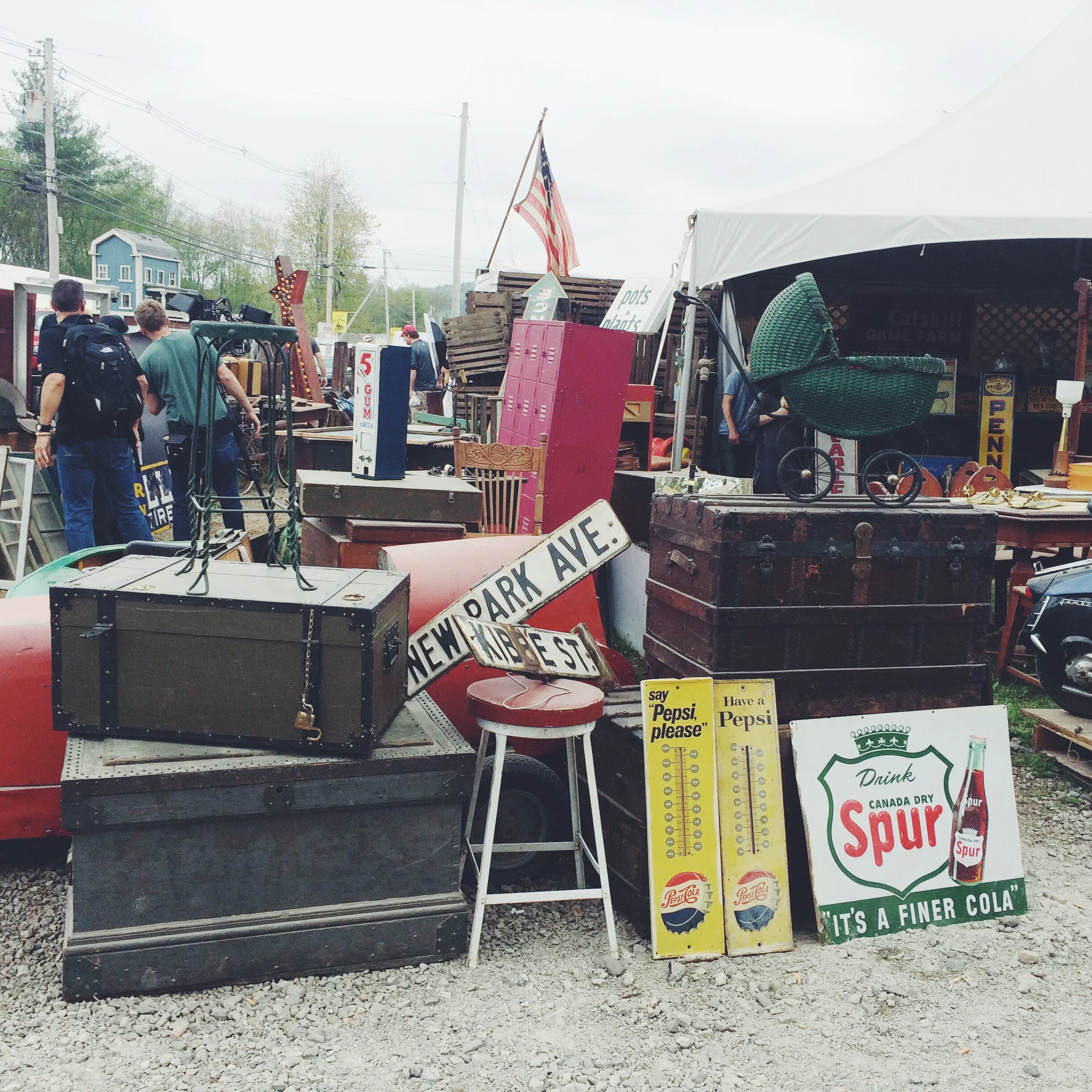 Look all the way to the left. See the camera people? They were filming an episode of Flea Market Flip !