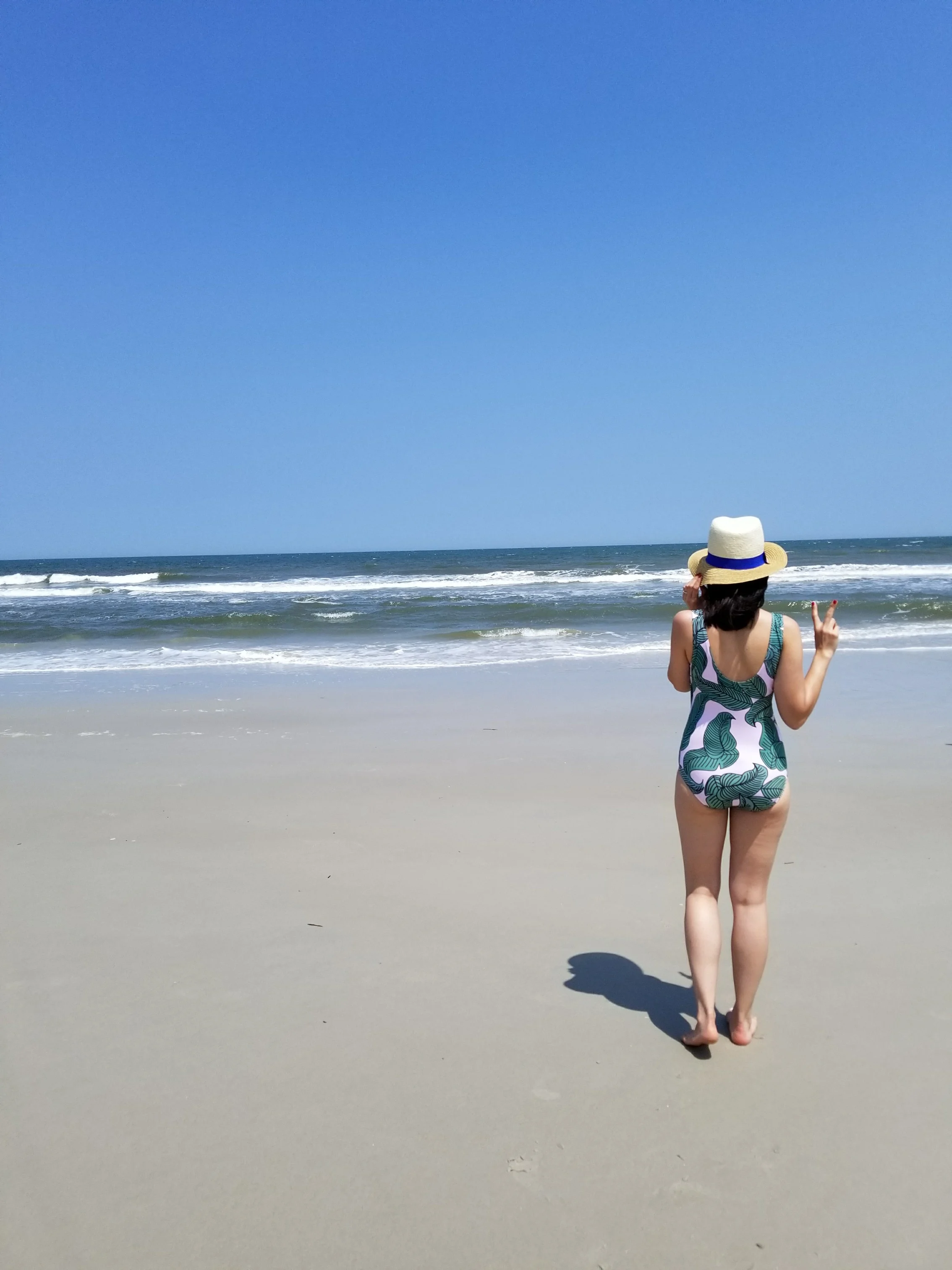 Hat: Banana Republic, under $15 clearance. Here are two other options from BR that are available: Eugenia Kim , $88 & Wide Brim Straw Hat , $48; One Piece: Yeah Bunny via MoMo .