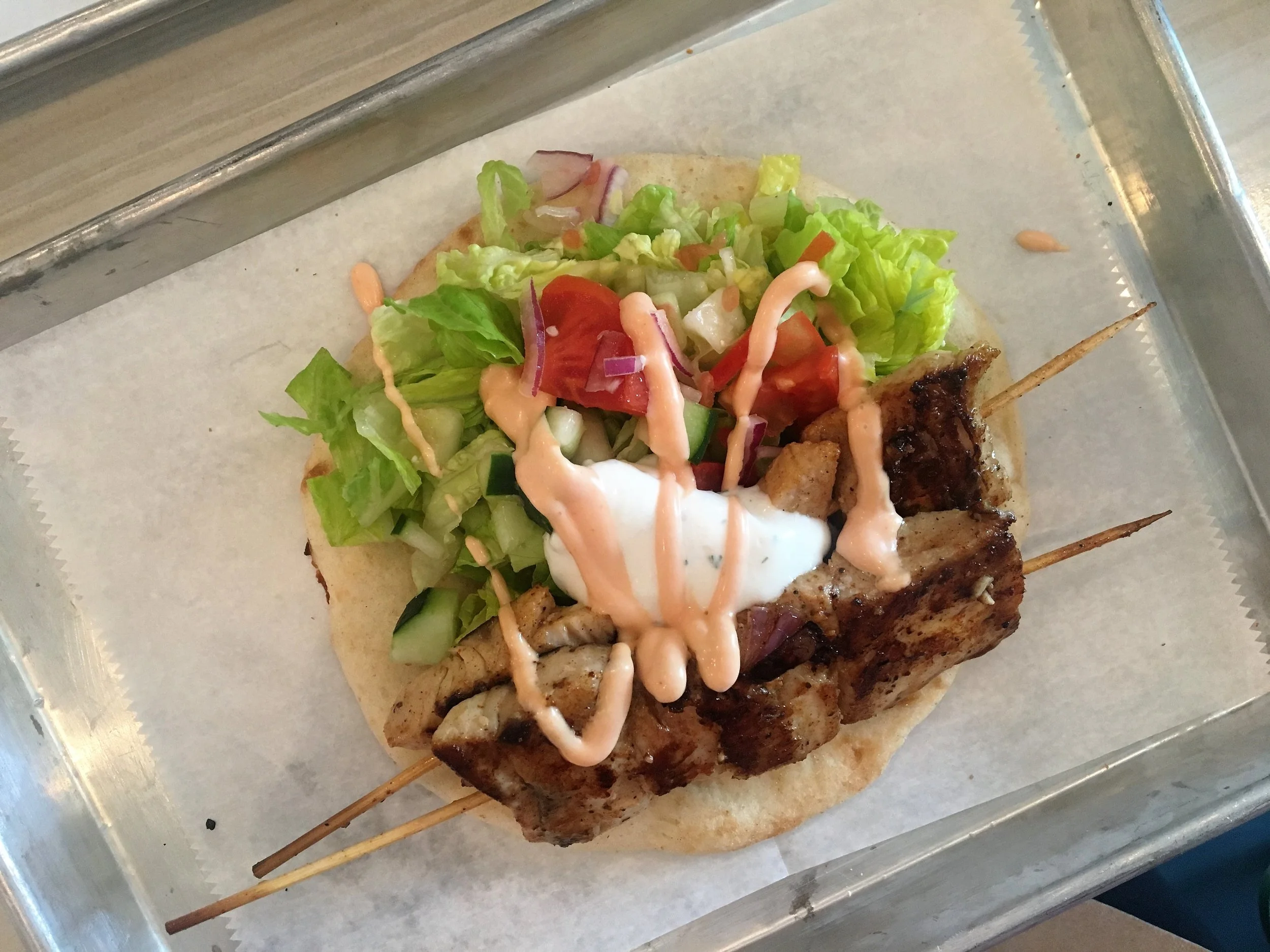 Pictured here is the mahi mahi gyro which I went halfsies on with Dan. The other half that I wolfed was the shrimp gyro. I also stole a bite (or three) of our friend's baklava. I love the sugary sweetness!