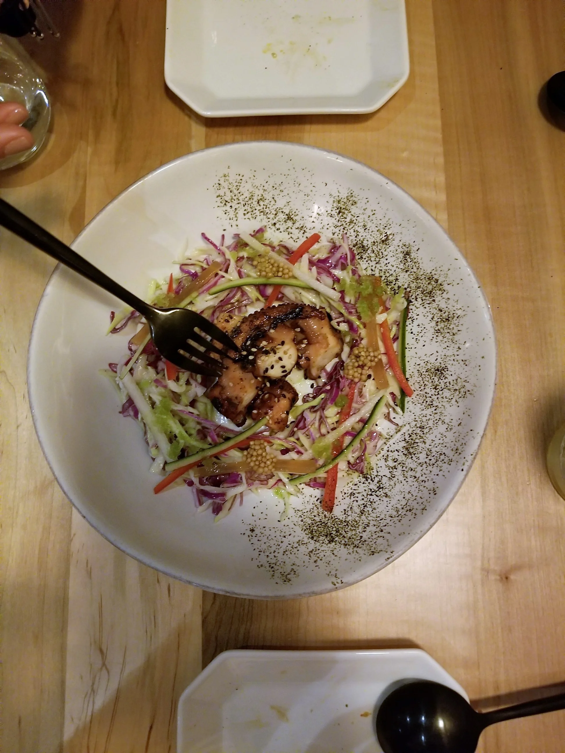 Our most FAVORITE meal was at DOMA , a French - Korean restaurant. Their menu rotates monthly, with a few fan favorites as repeats. We opted for the tasting menu (6 entrees and 2 desserts). This was the perfect way to taste a little of everything on the menu. Pictured above is the grilled octopus.