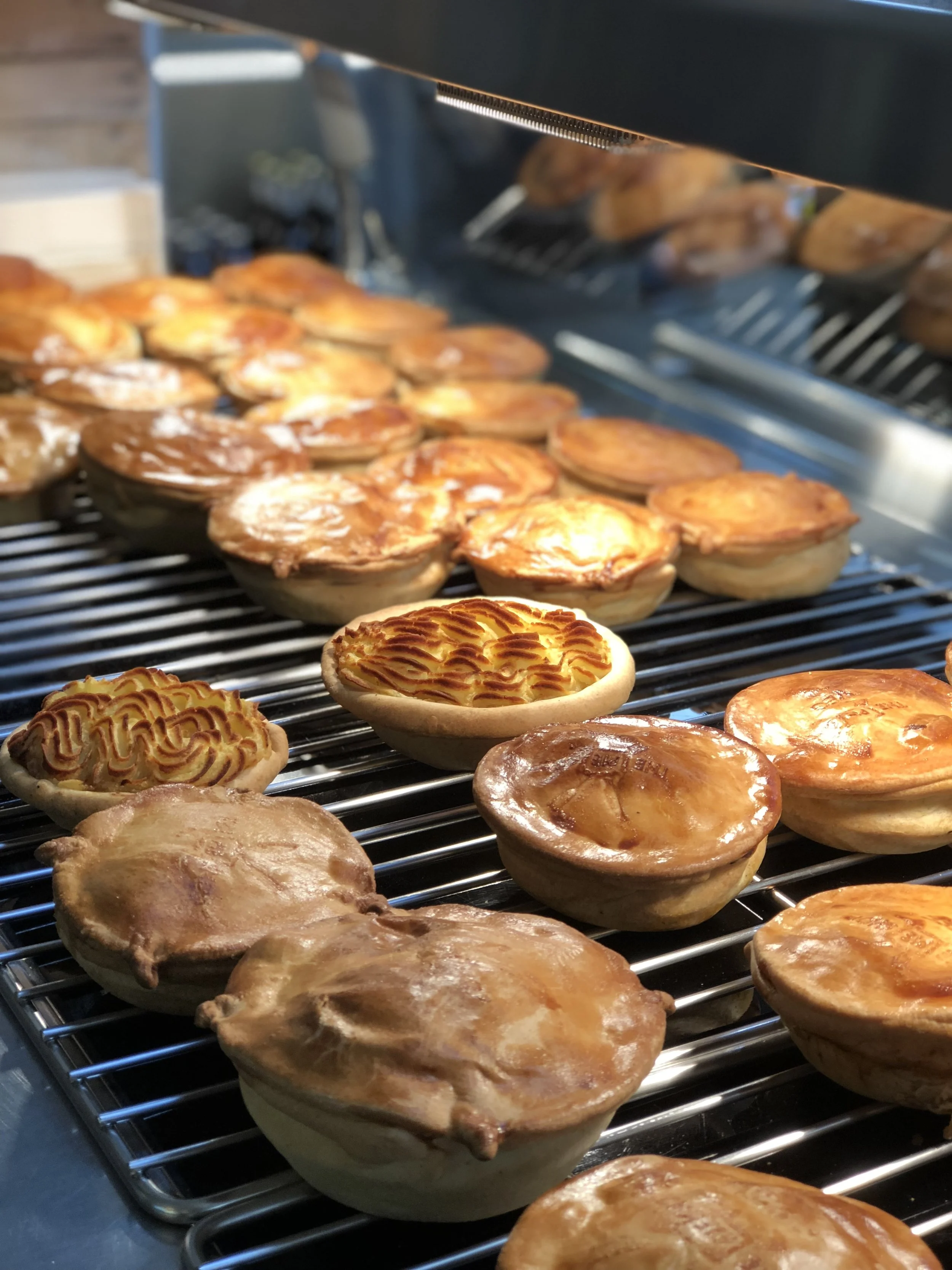 While exploring the Viaduct neighborhood, we stumbled upon a food hall. Needing a snack (which happens about every few hours or so), I stopped by The Pie Shop . So many mini pie options and if I recall correctly, I went with a curry flavored option. The food hall was also a great place to duck into to cool off with some AC!