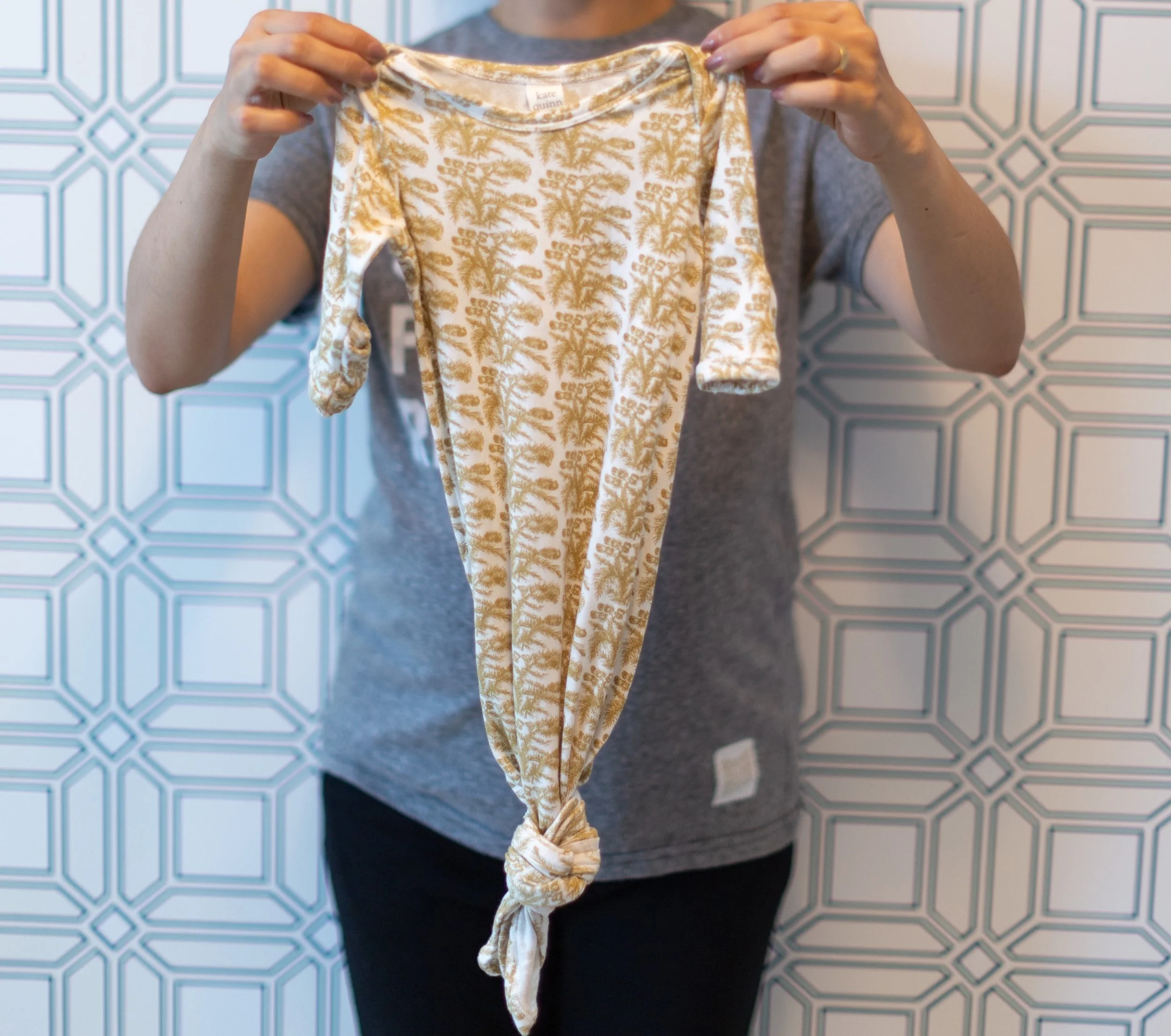 Through my reading, I learned of a recommendation to purchase sleeping gowns with an elastic bottom. This is supposed to be helpful when the baby is sleeping for quick changes. However, some have said that with the elastic bottom, the gown tends to ride up while the baby is sleeping. After some research, I came across Kate Quinn Organics. All items are 100% organic cotton (so soft!) and made in the cutest prints. I ended up purchasing a couple of the knotted gowns , a blanket and hat . Keep an eye out on the website for sales (my entire purchase was 40% off!).